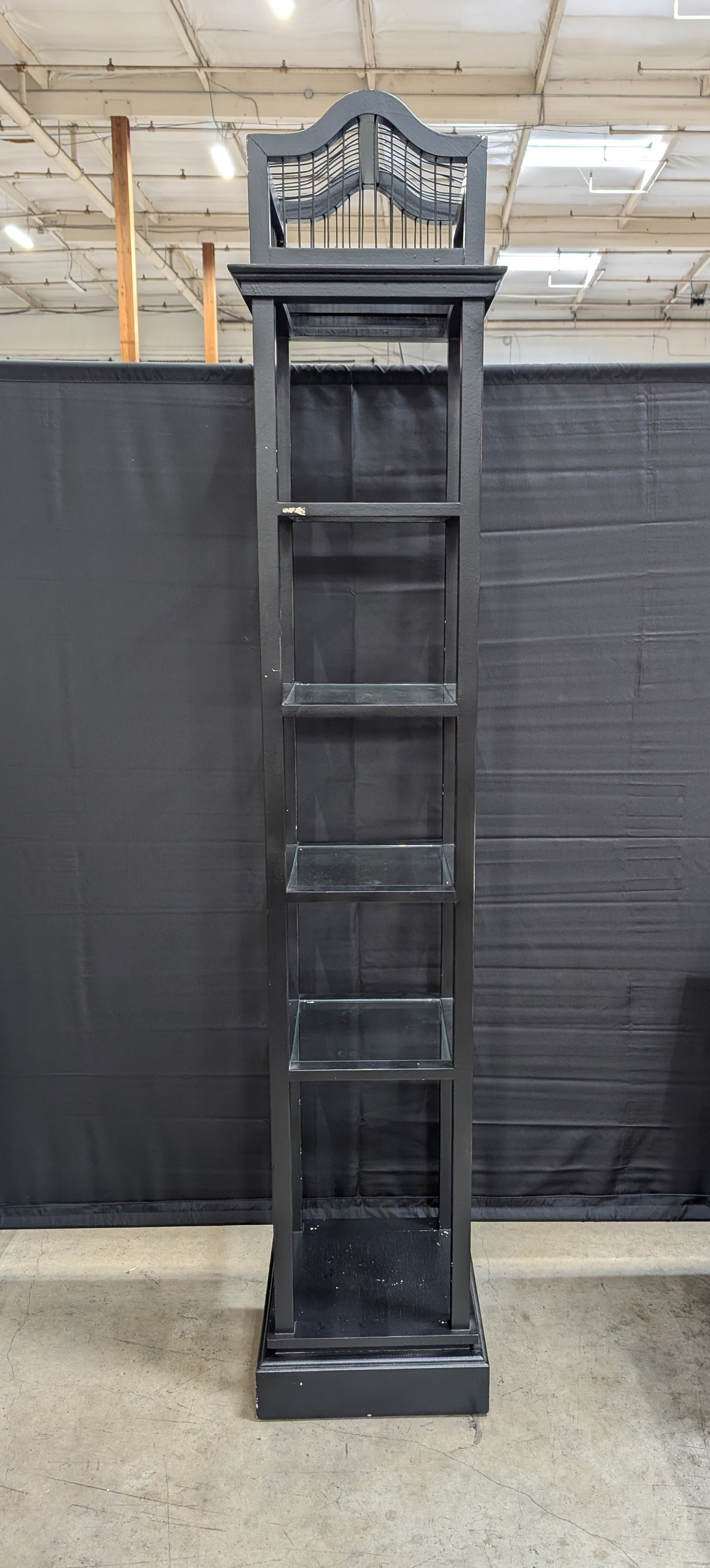 Slim Black Display Shelf Unit with Decorative Finial Top and Molded Base