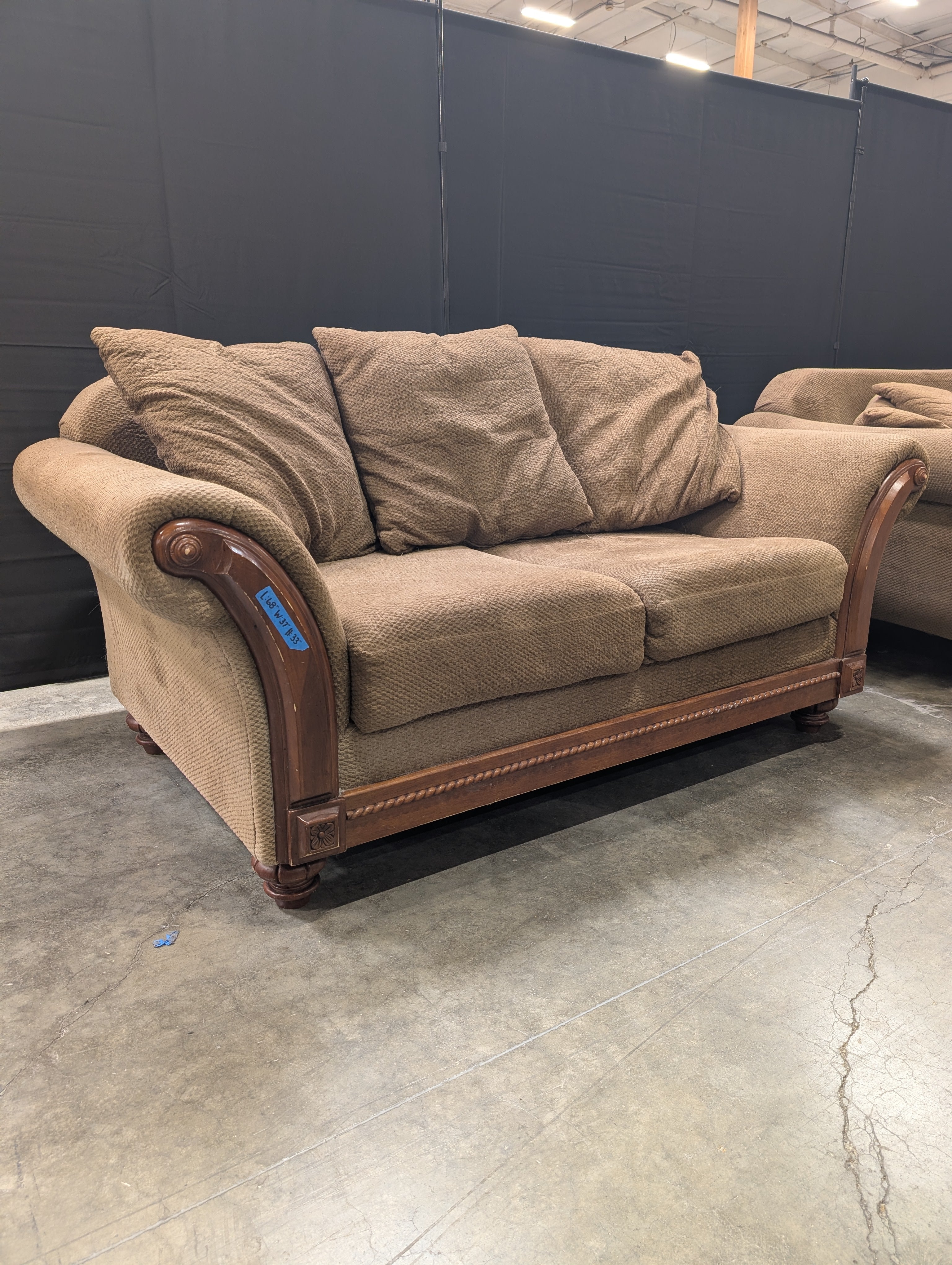 Brown Textured Fabric Loveseat with Wood Trim