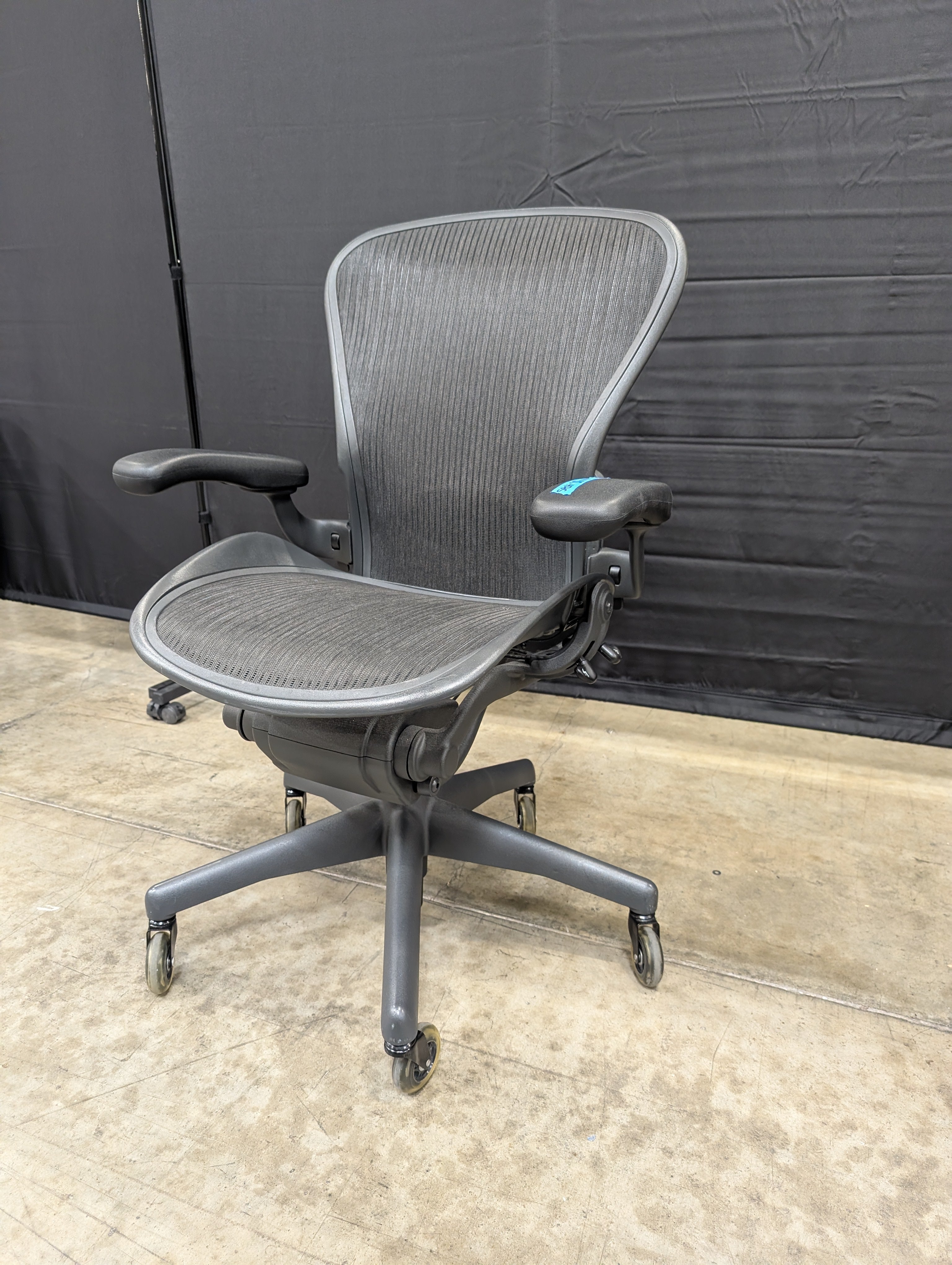 Black Mesh High-Back Herman Miller Office Chair with Headrest