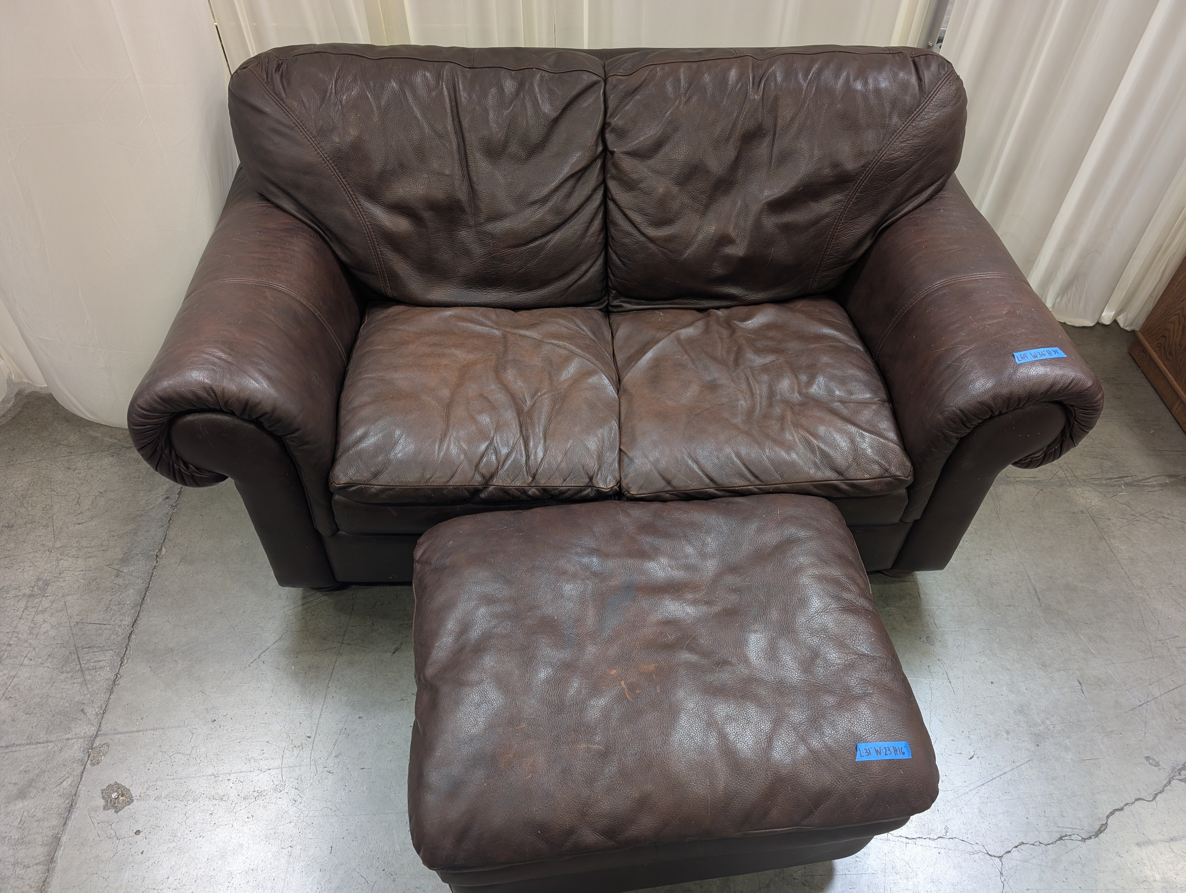 Dark Brown Leather Rolled Arm Couch with matching Ottoman
