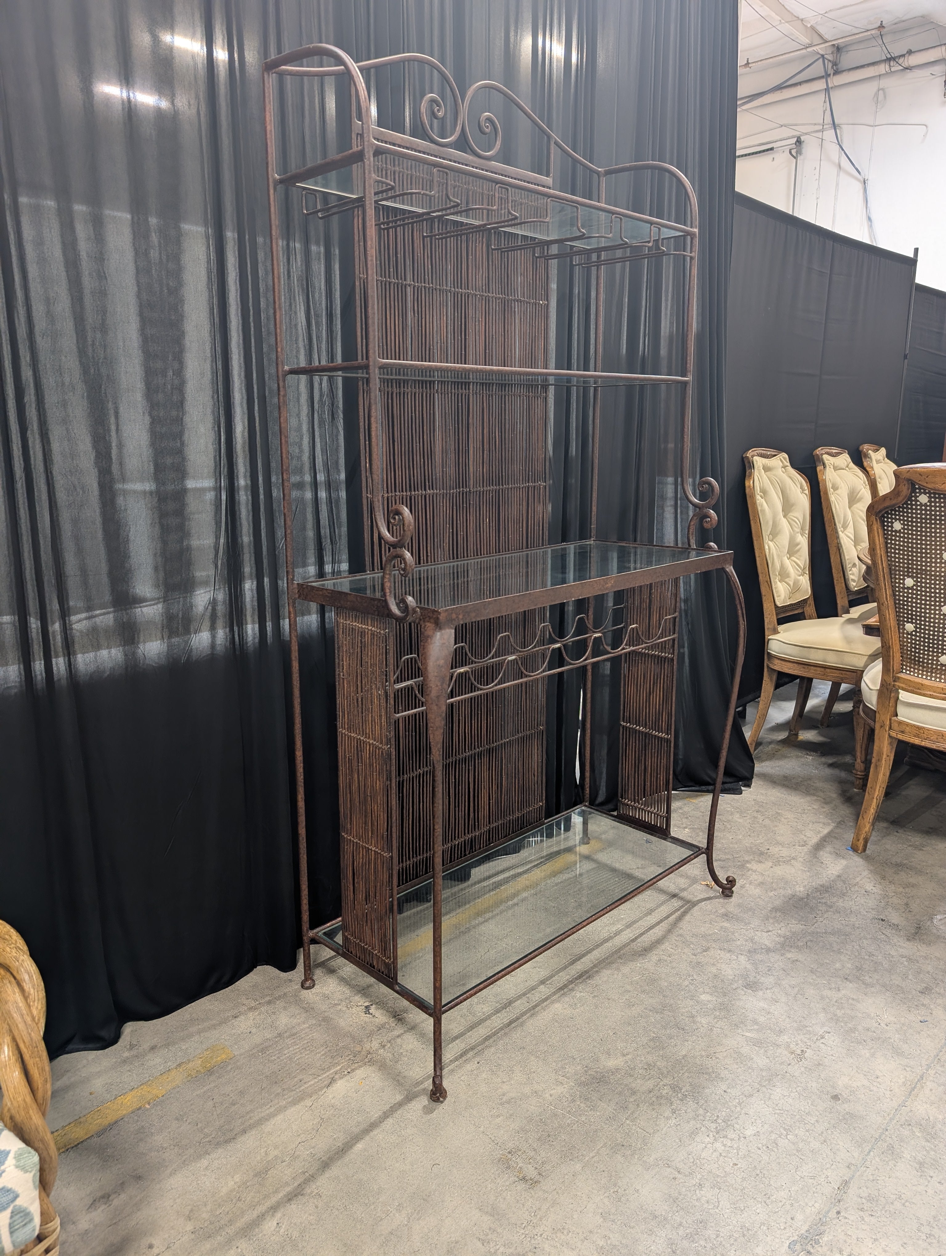 Ornate Dark Metal Baker's Rack with Woven Back