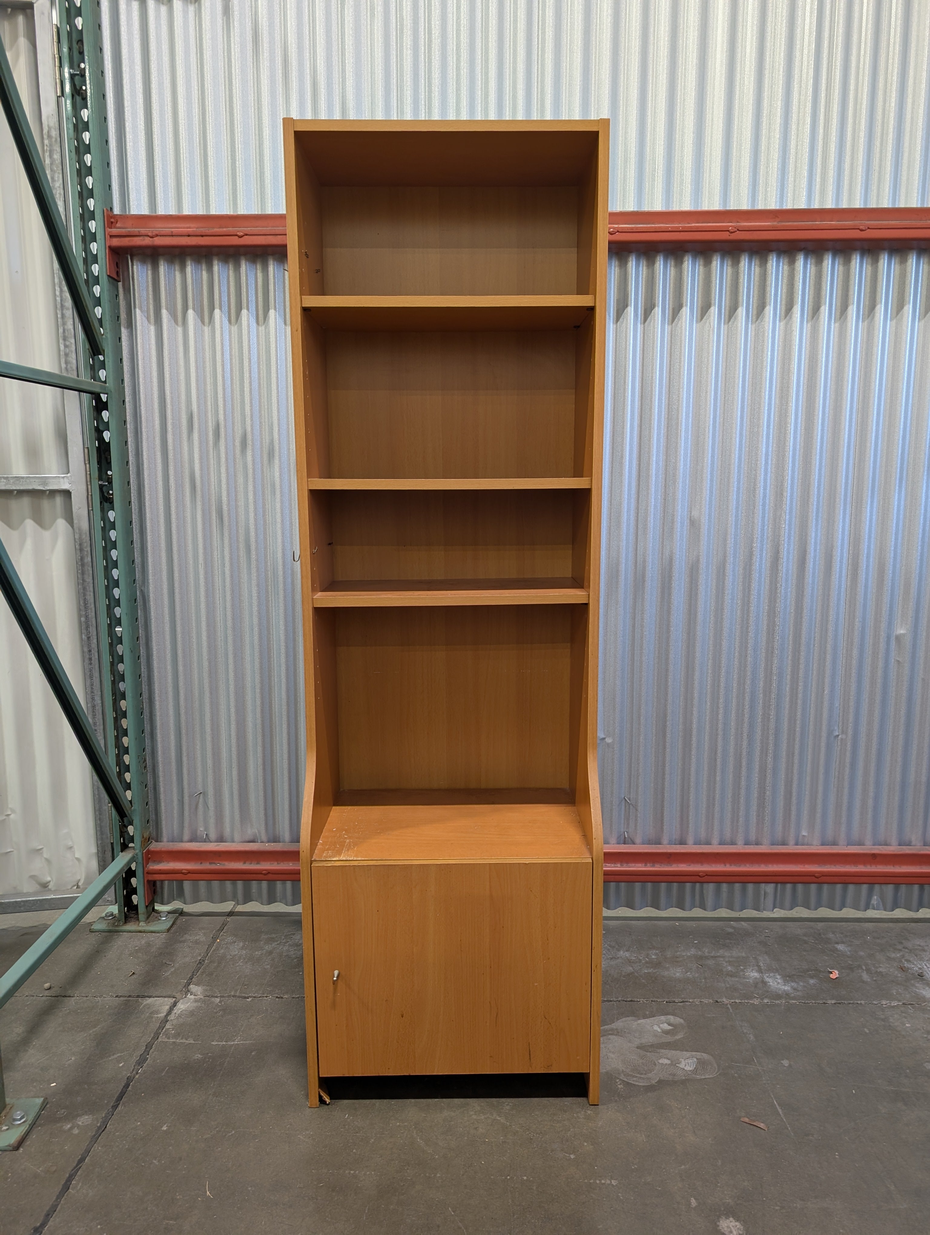 Functional Light Wood Bookcase with Integrated Cabinet