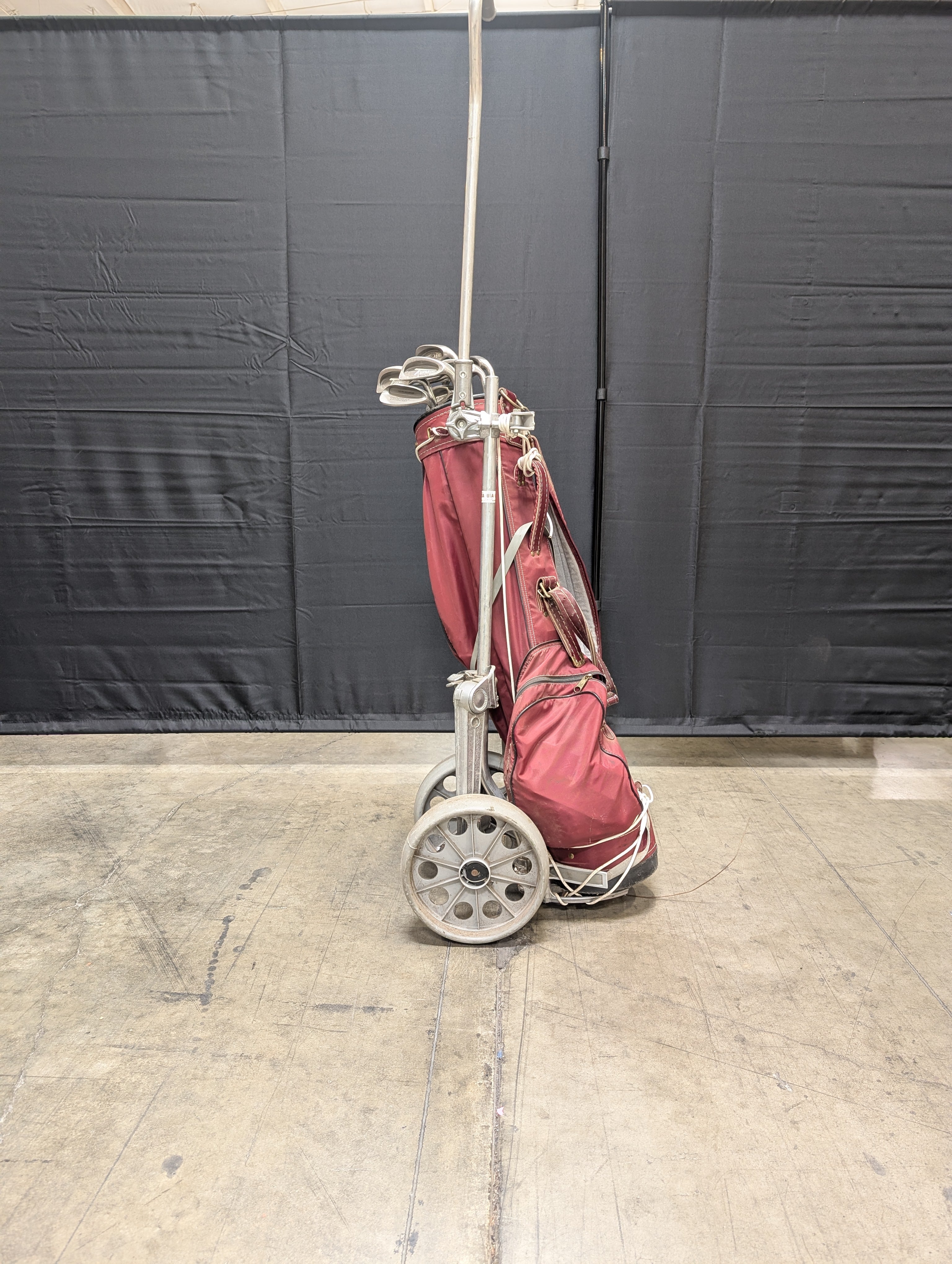 Set of Eleven Golf Clubs with Red Cart Bag and Push Cart
