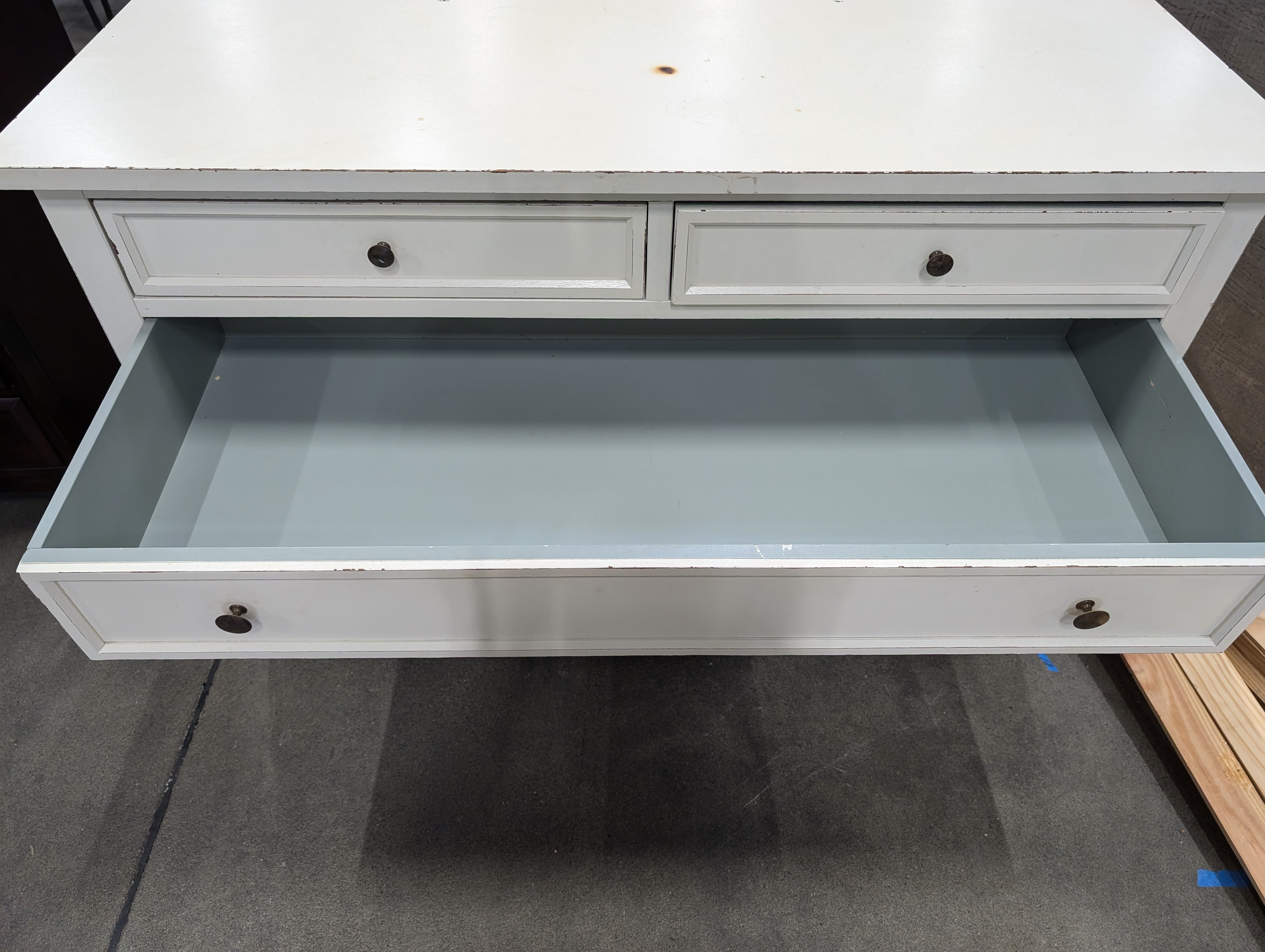 Distressed Off-White Five-Drawer Chest with Dark Knobs