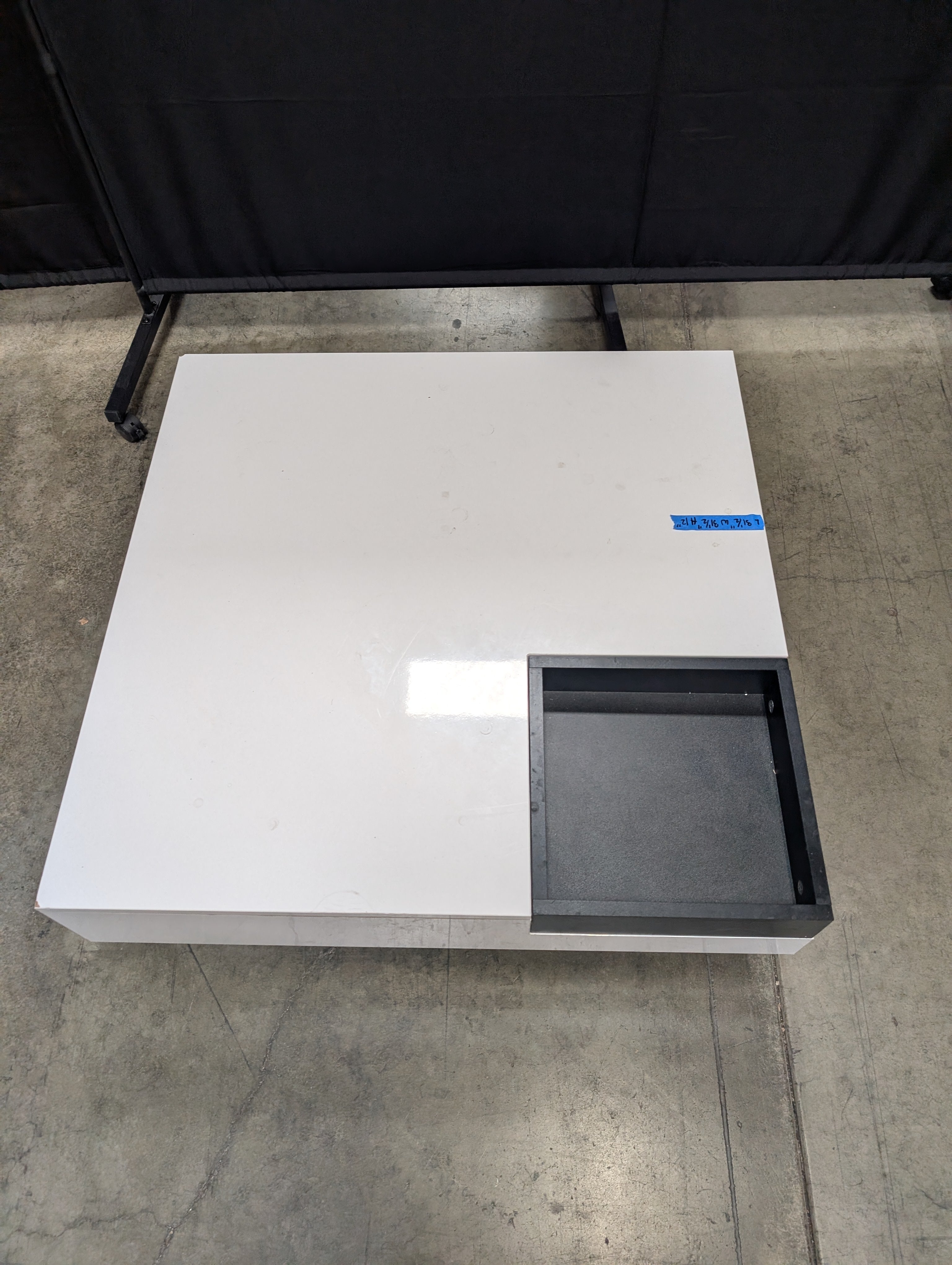 Contemporary High-Gloss White Coffee Table with Black Recessed Compartment