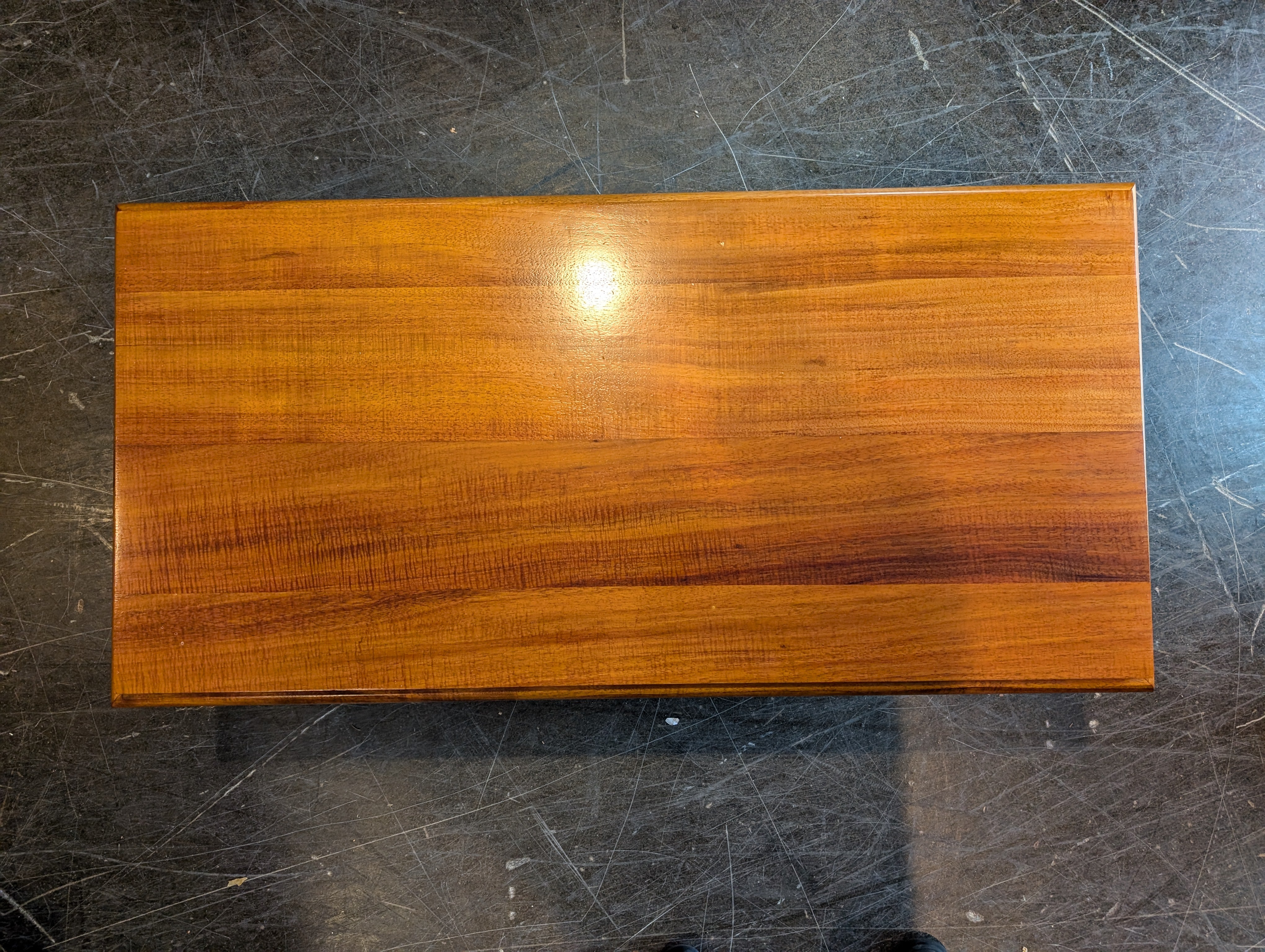 Rich Brown Hardwood Coffee Table with Carved Detail