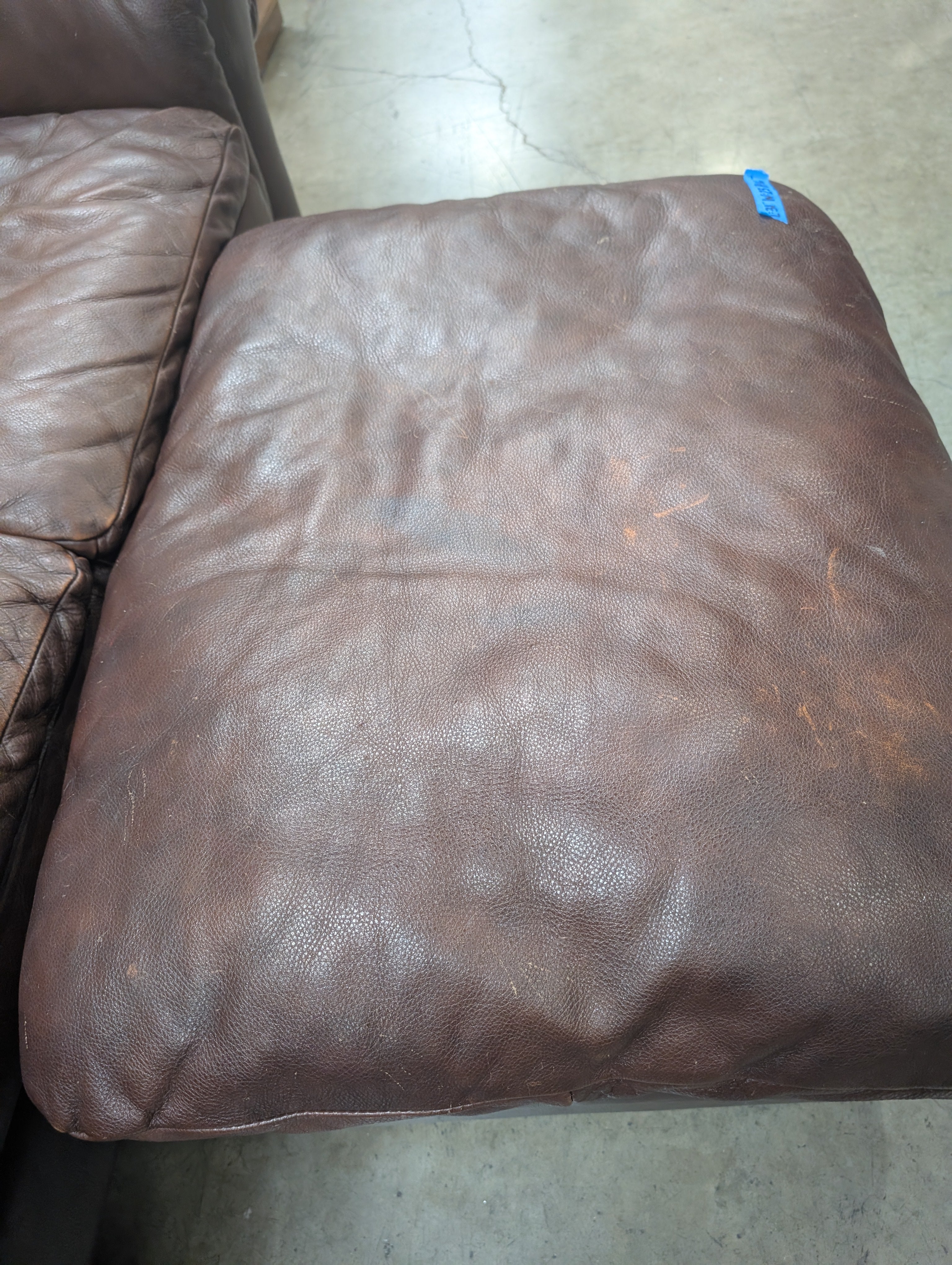 Dark Brown Leather Rolled Arm Couch with matching Ottoman