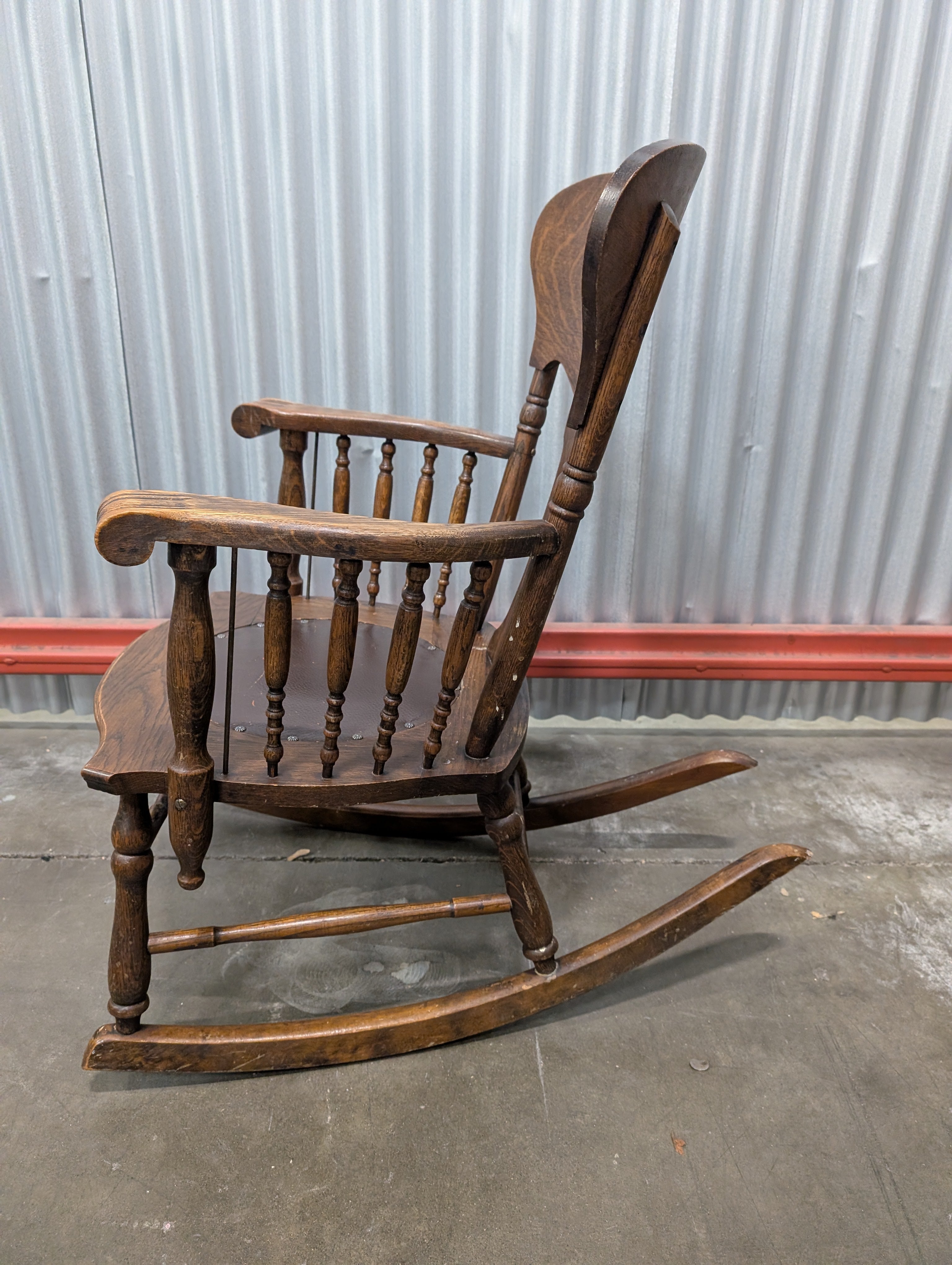 Antique Dark Wood Rocking Chair with Leather Seat