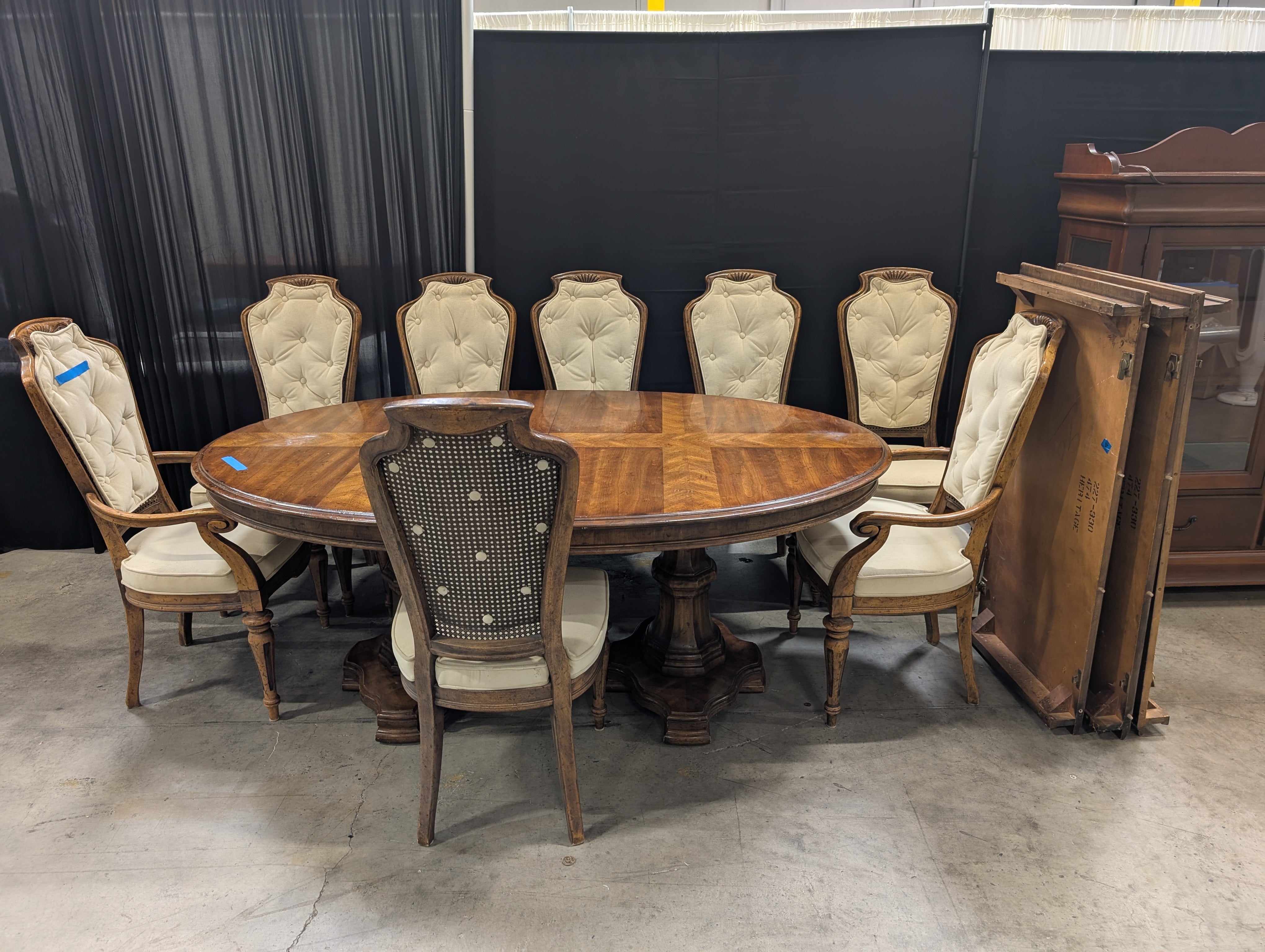 Traditional Carved Wood Dining Table with Eight Upholstered Chairs and Three Leafs