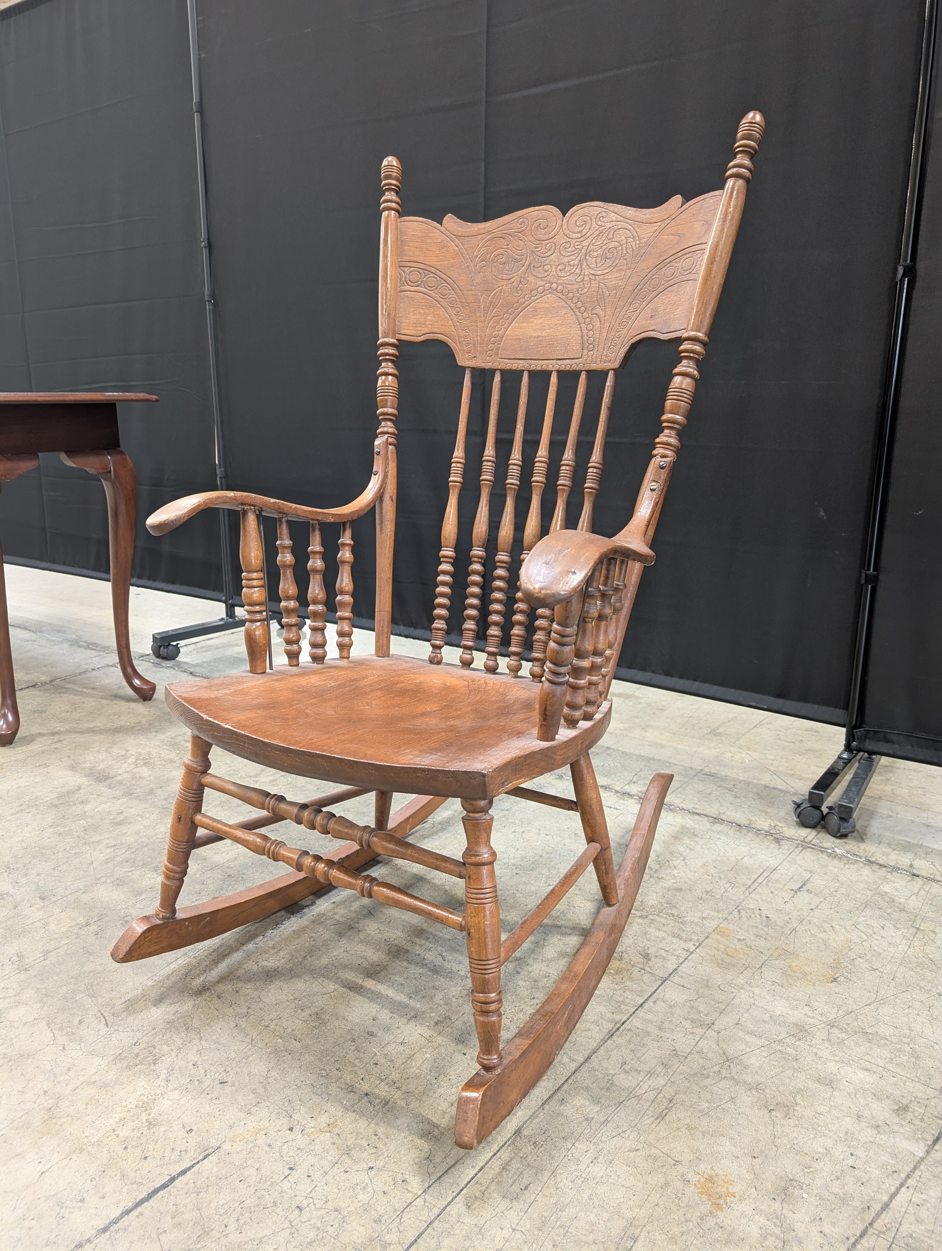 Classic Hardwood Rocking Chair with Ornate Carved Backrest