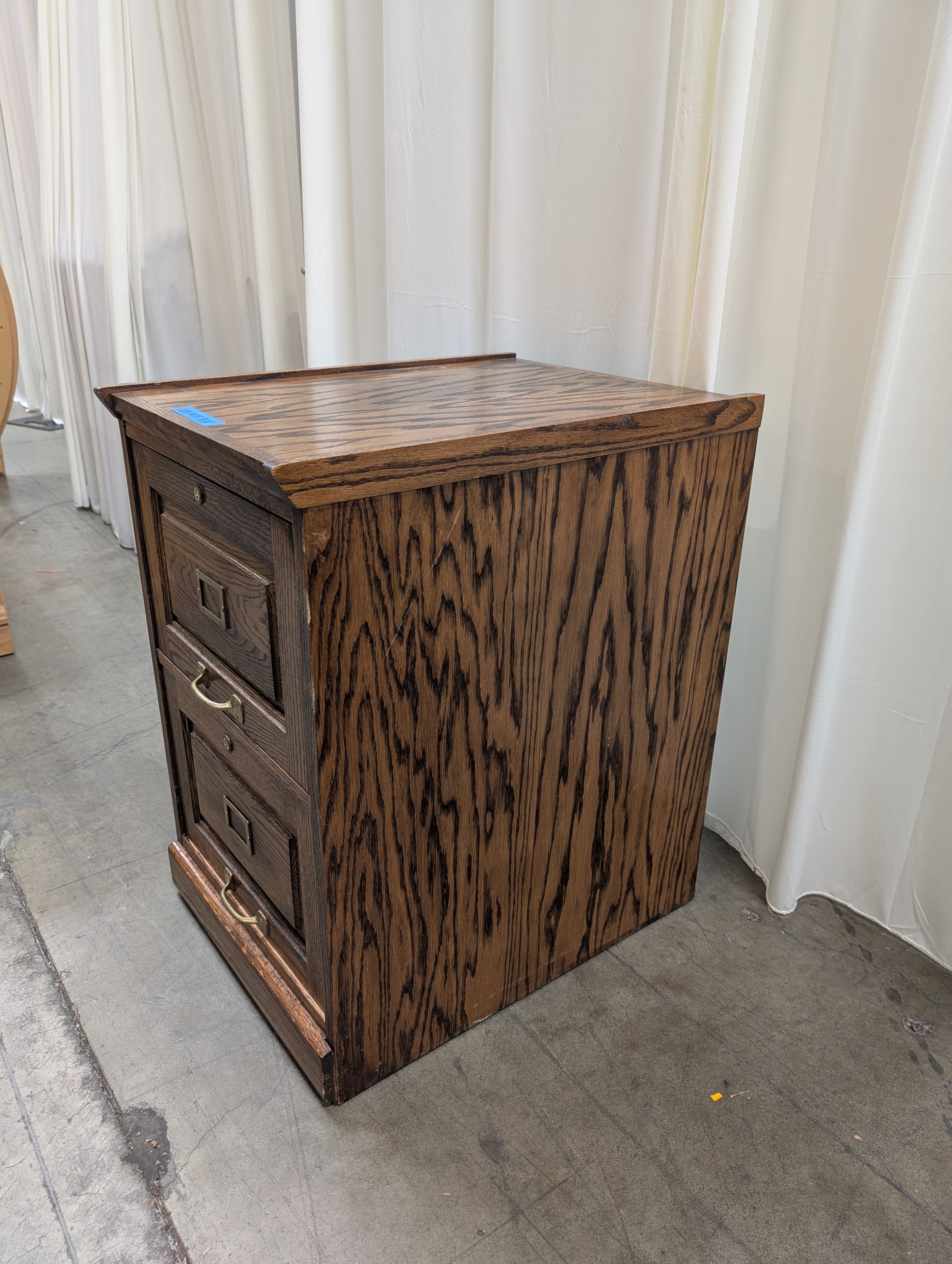 Dark Brown Wood Three-Drawer Filing Cabinet with Brass Hardware