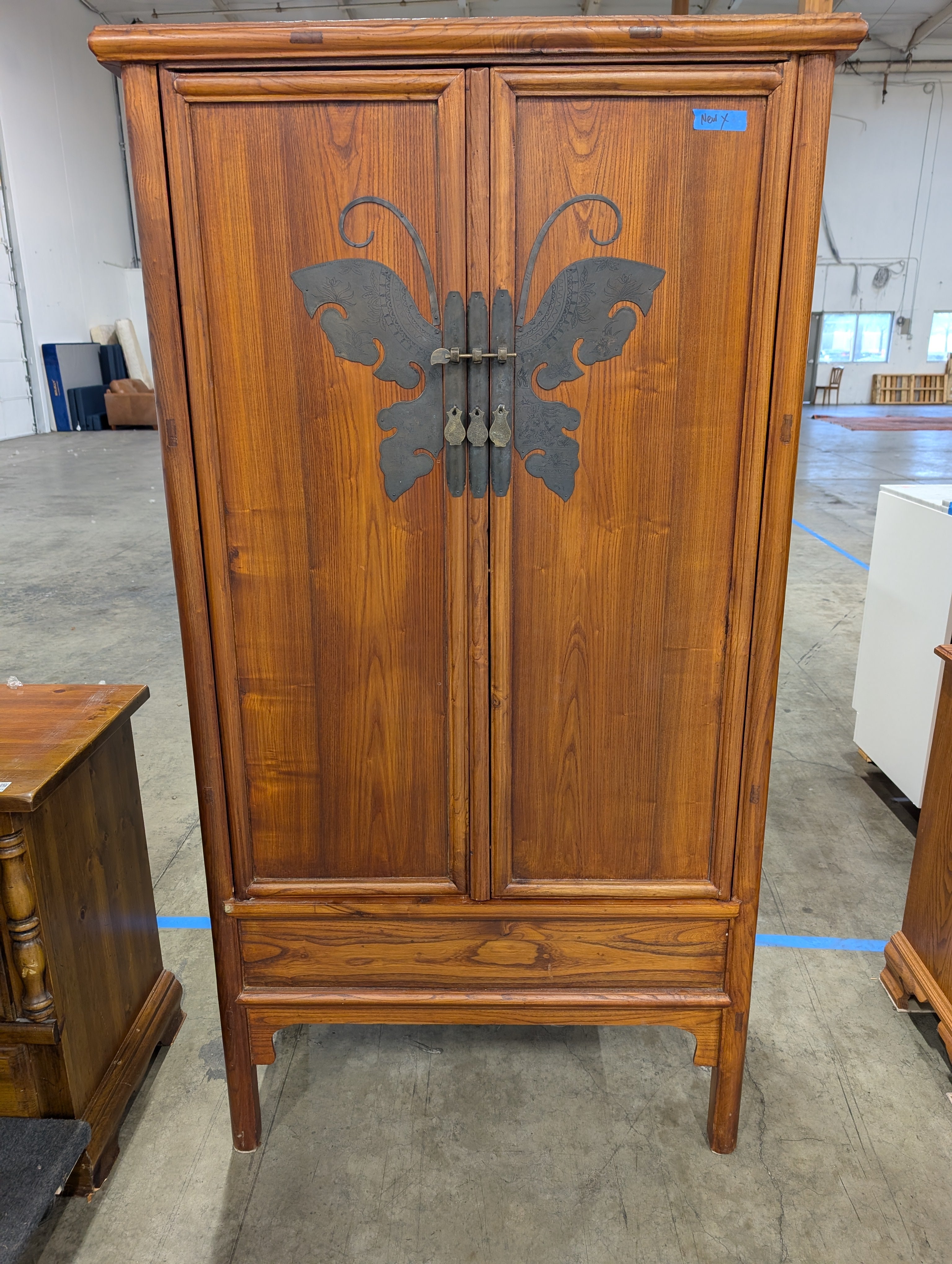 Ornate Hardwood Storage Cabinet with Decorative Butterfly Latch