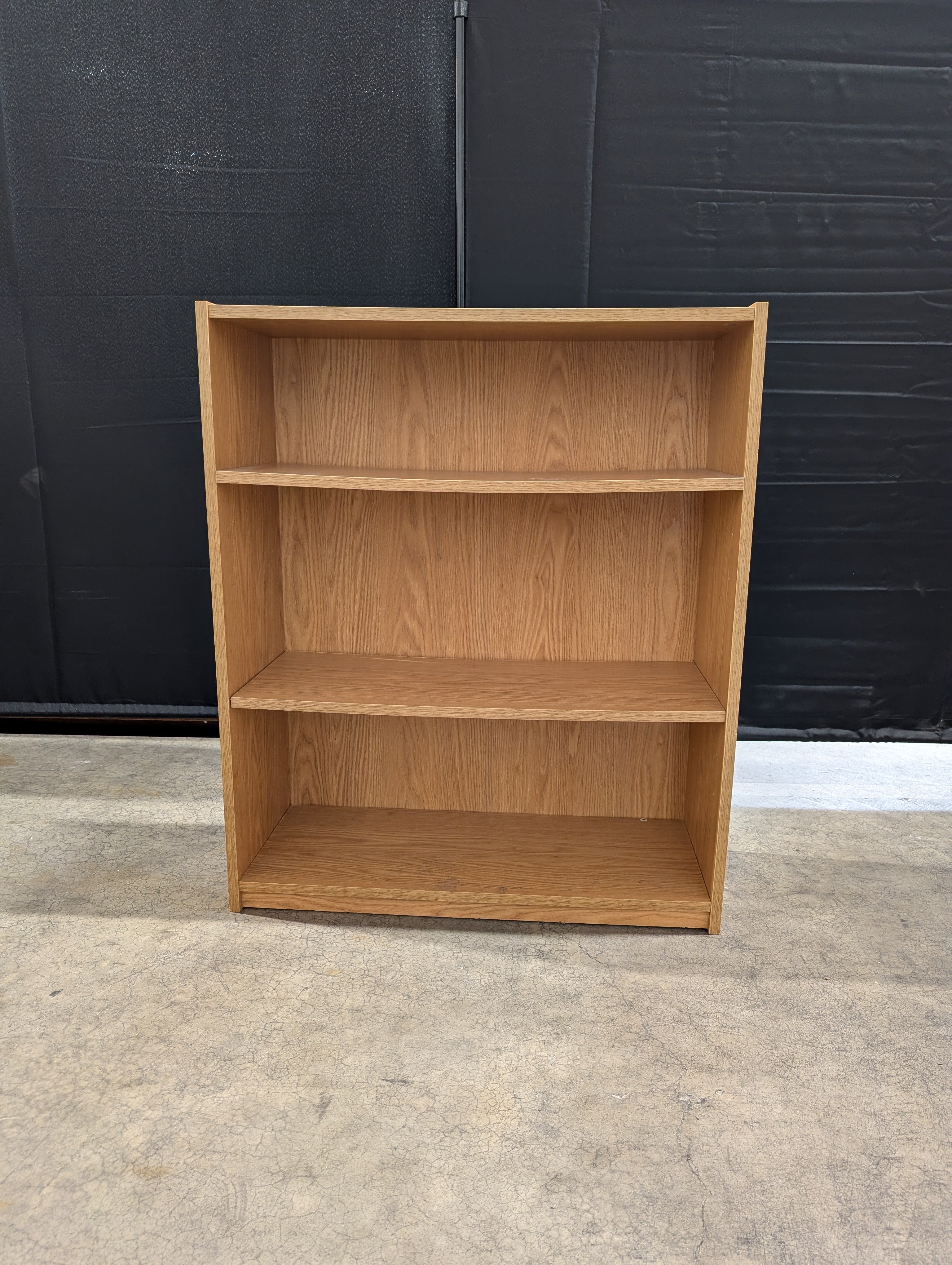 Versatile Light Brown Wood Grain Bookcase Shelving Unit