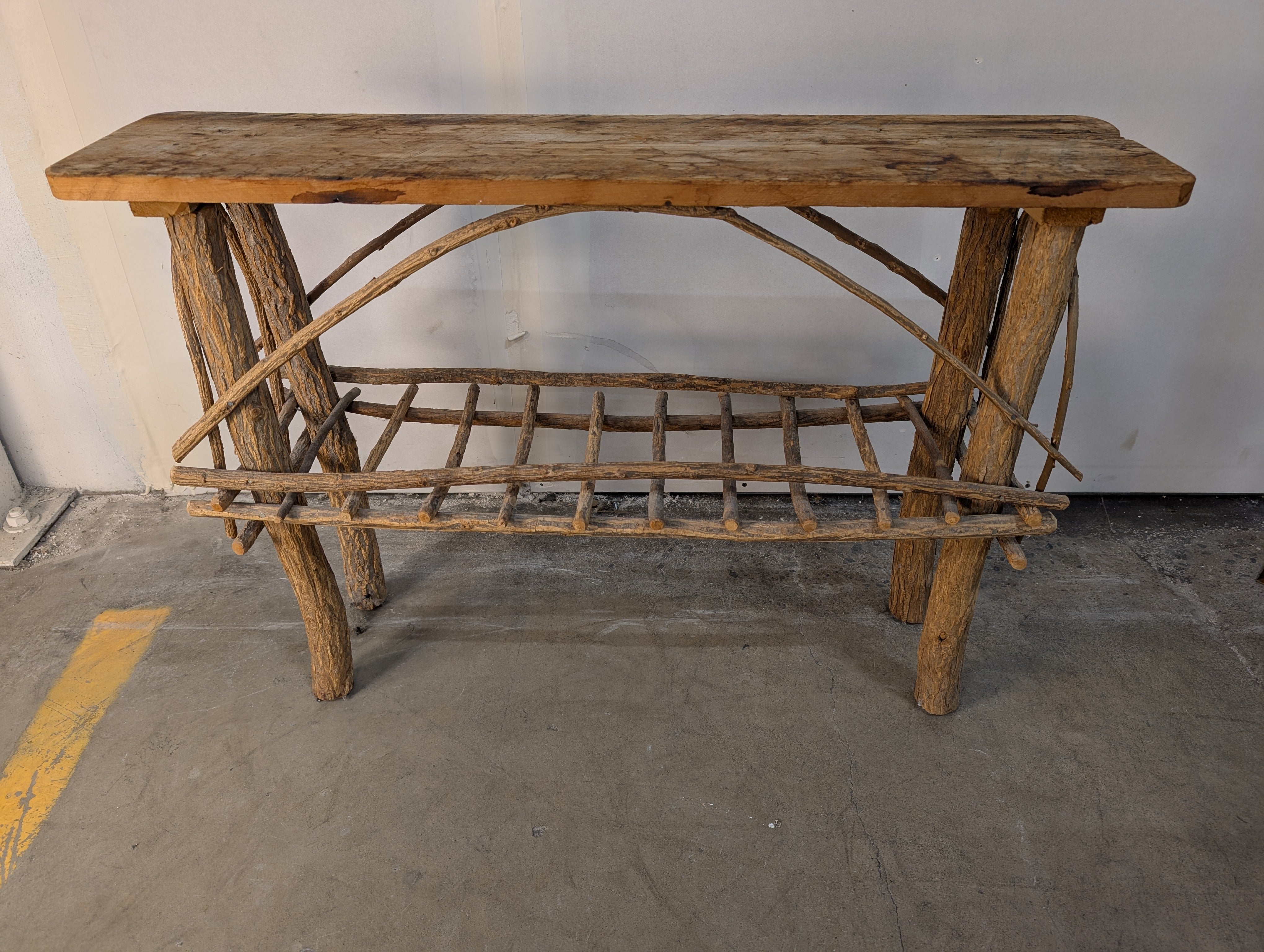 Rustic Natural Wood Plank Console Table with Twig Base