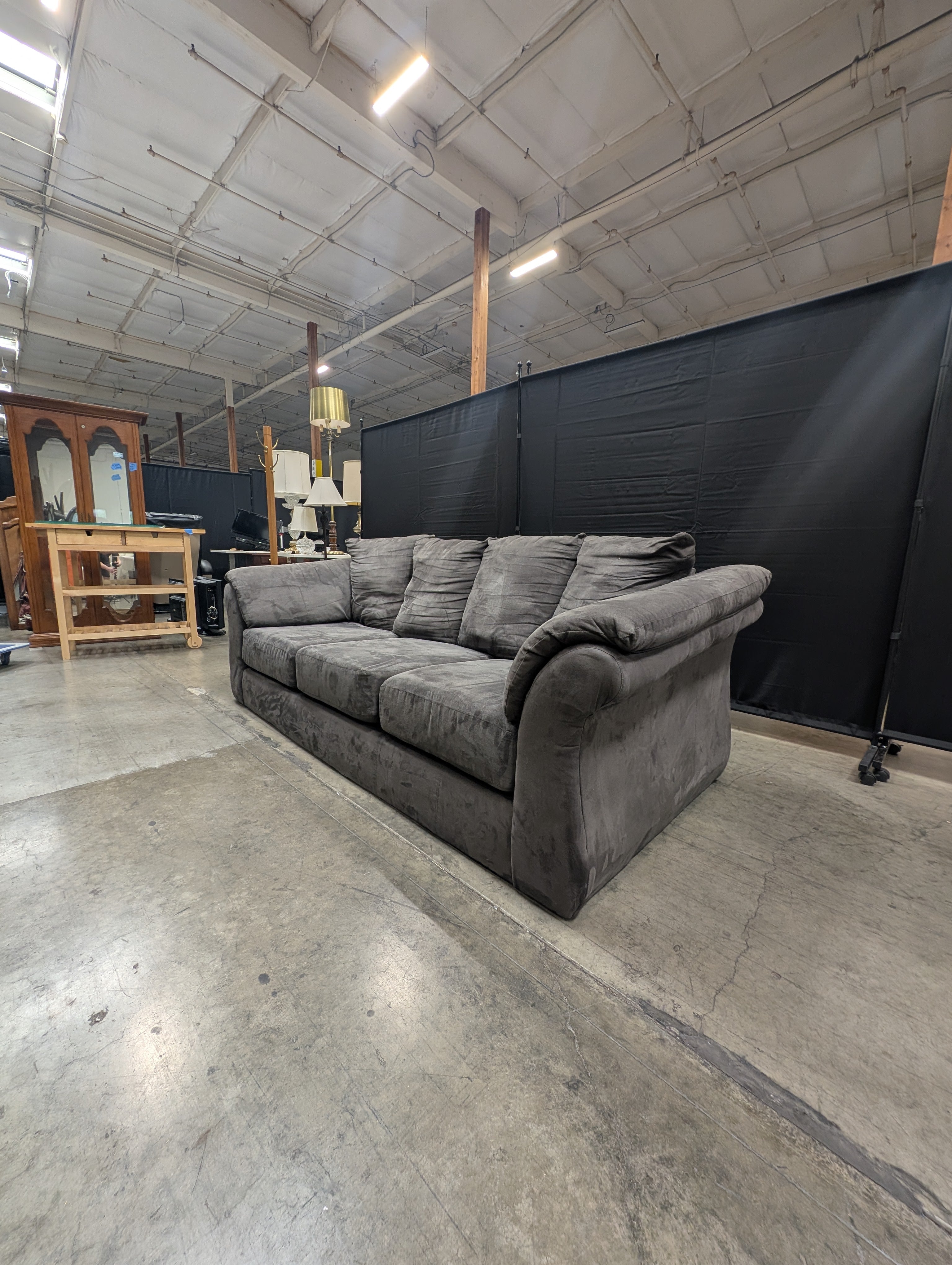 Spacious Three-Seater Grey Upholstered Sofa