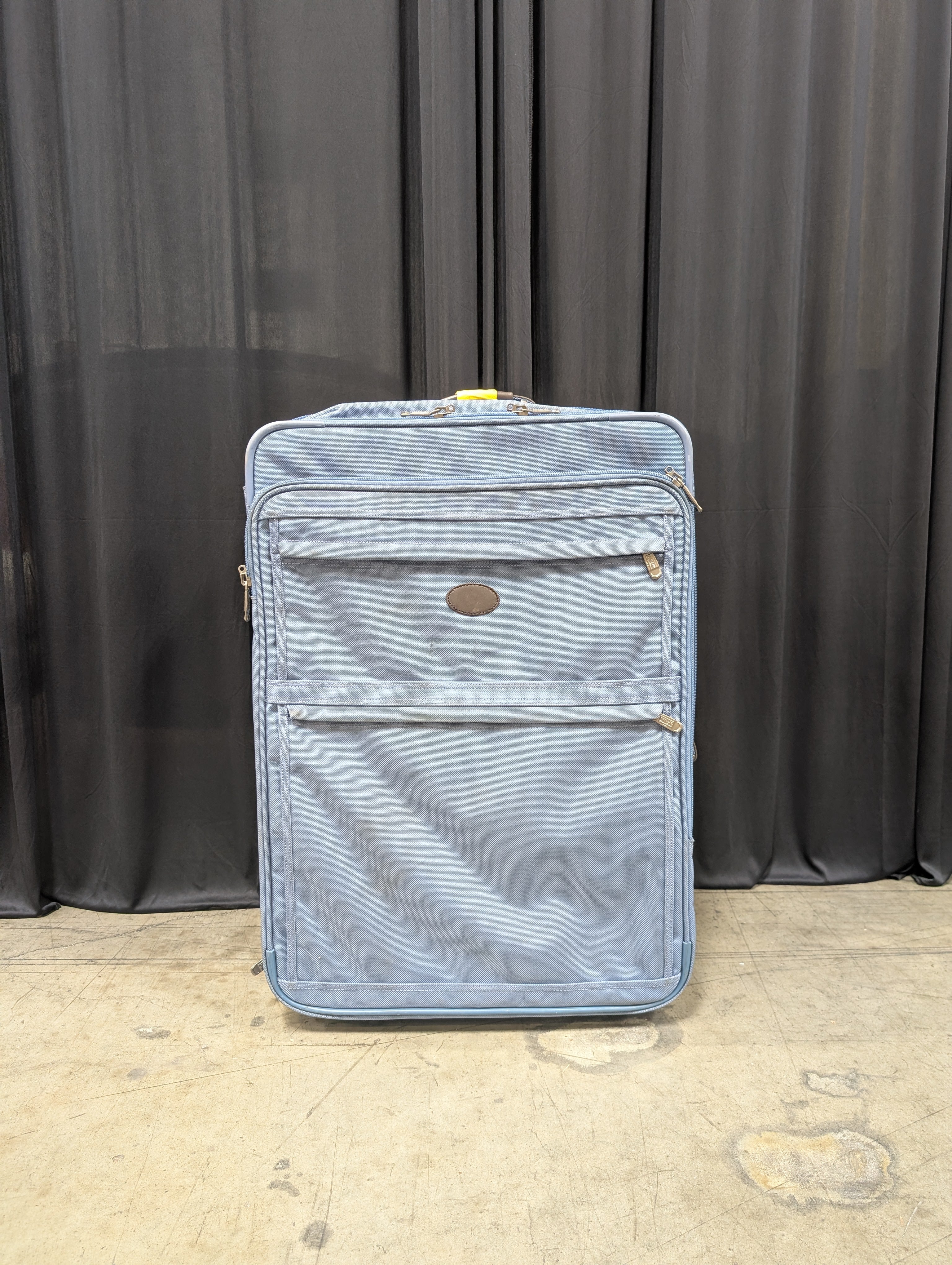 Light Blue Rolling Suitcase with Retractable Handle