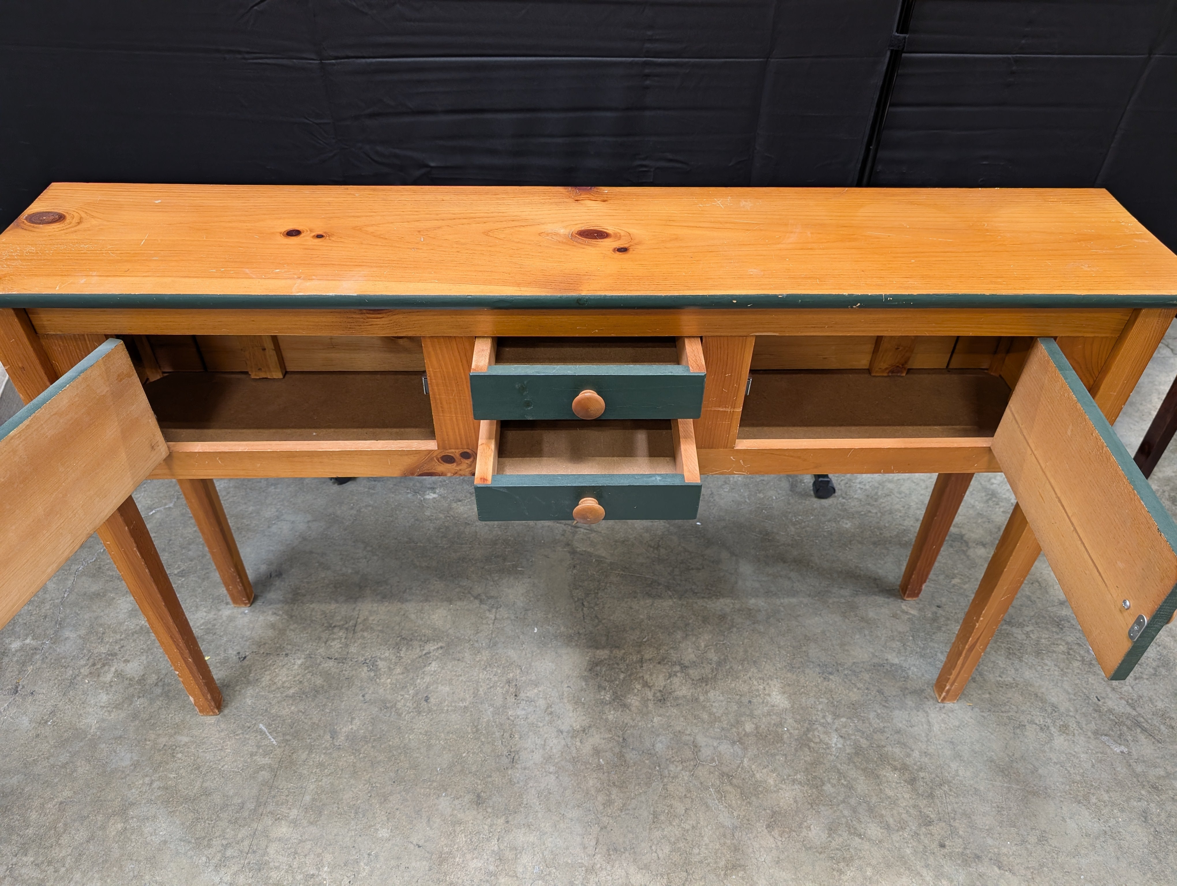 Rustic Wood Console Table with Dark Green Cabinetry