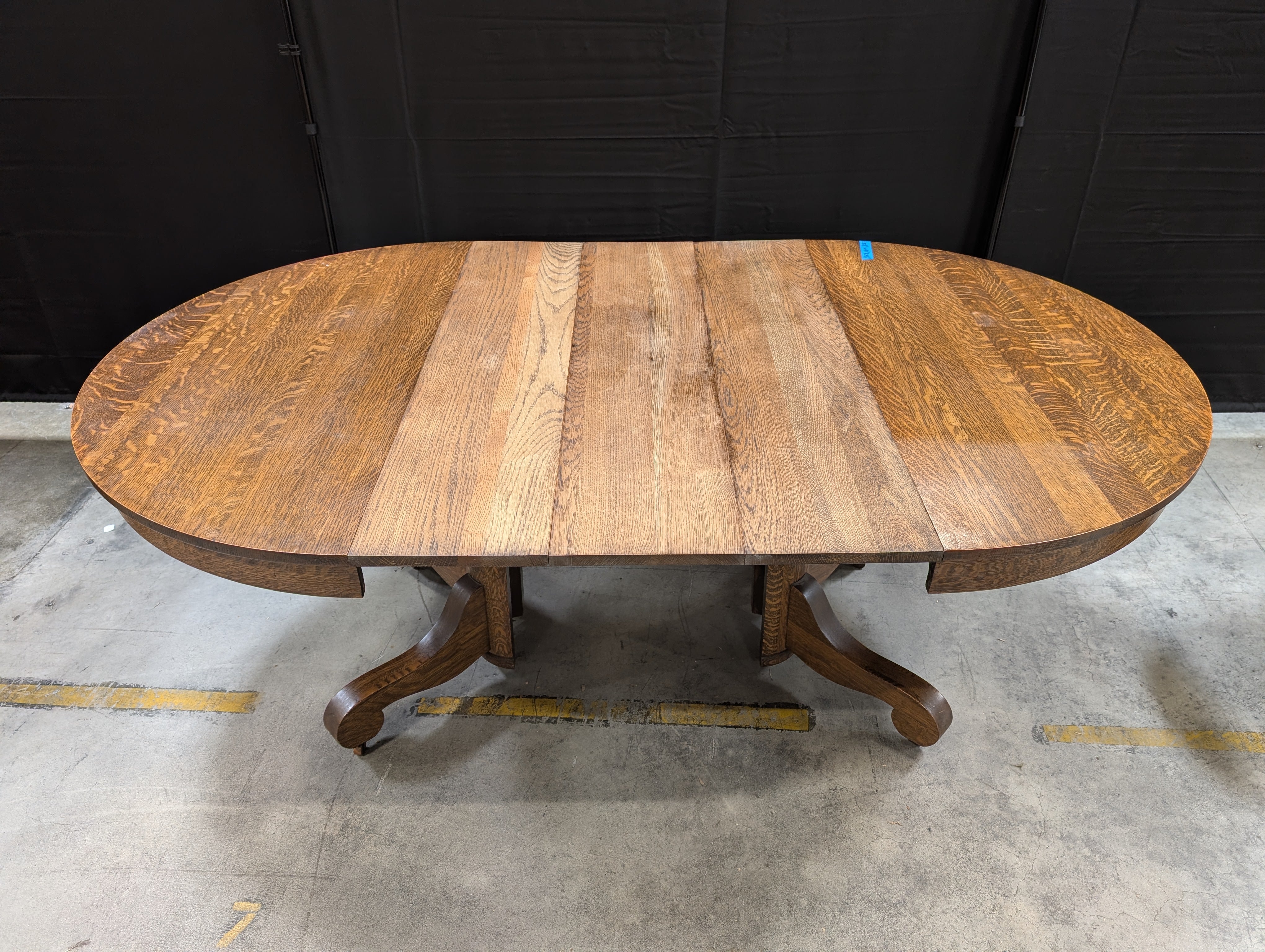 Round Dark Stained Wood Pedestal Dining Table