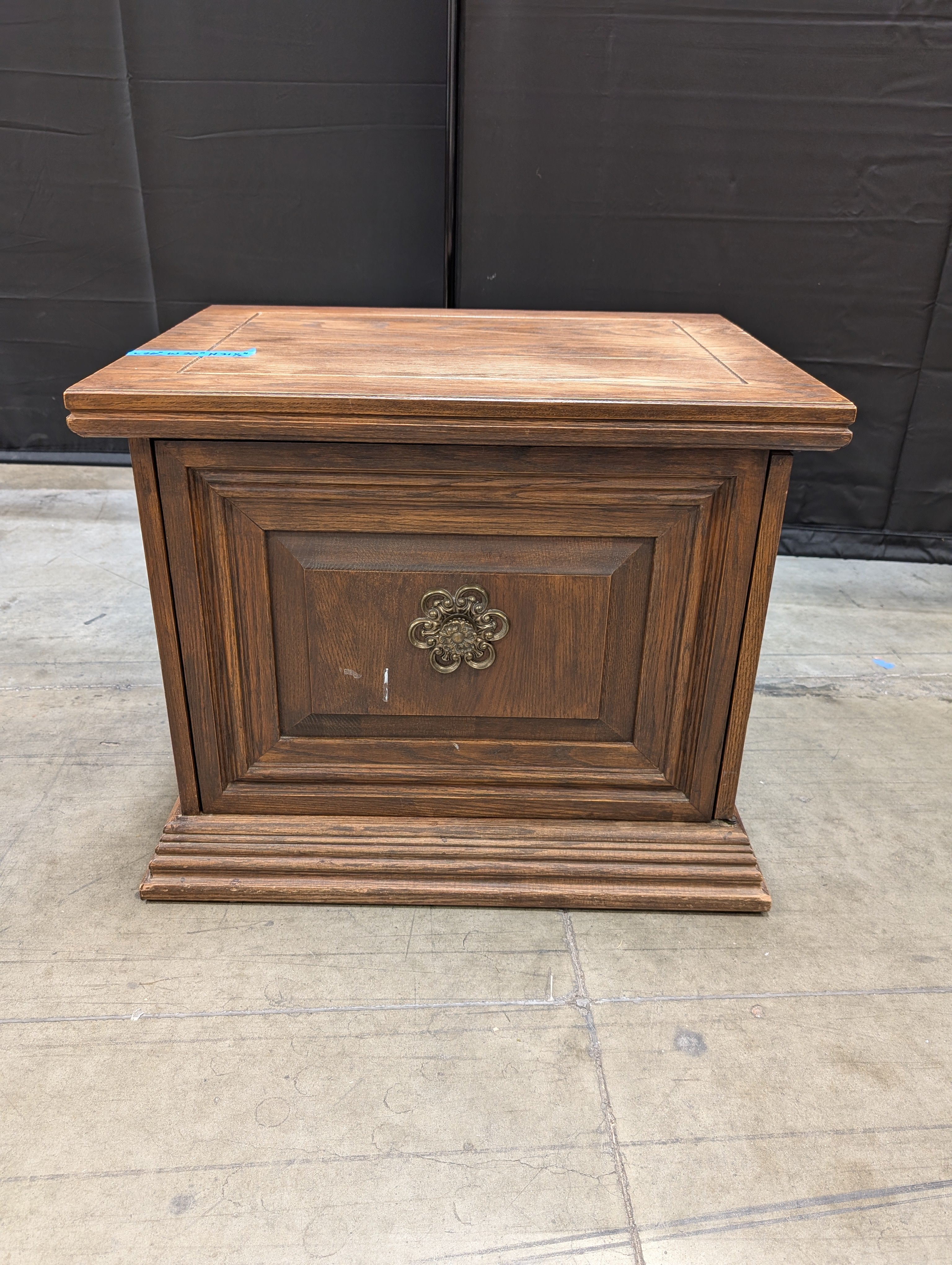 Traditional Hardwood Nightstand with Ornate Medallion Pull