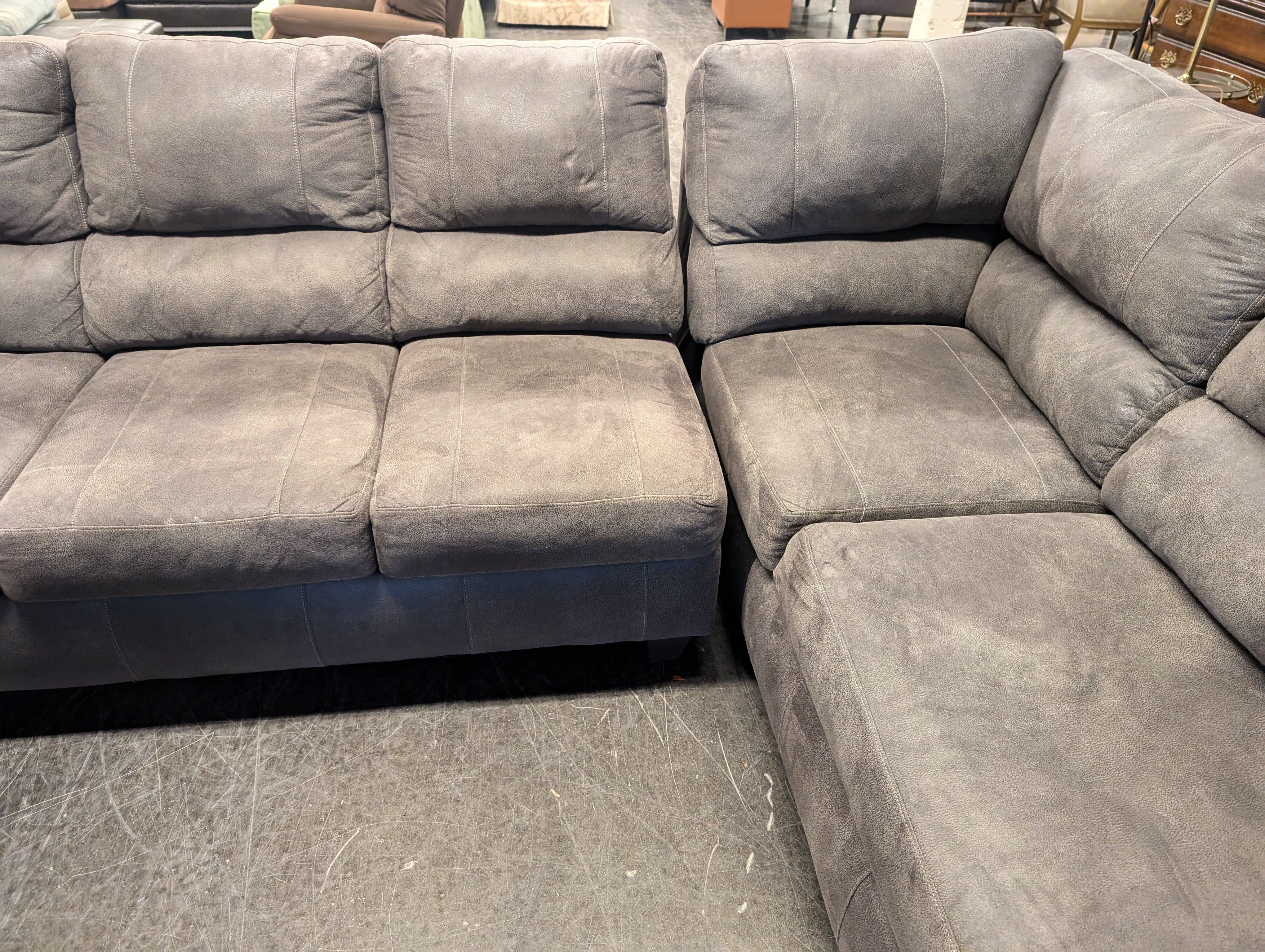 Spacious Taupe Sectional Sofa with Integrated Chaise