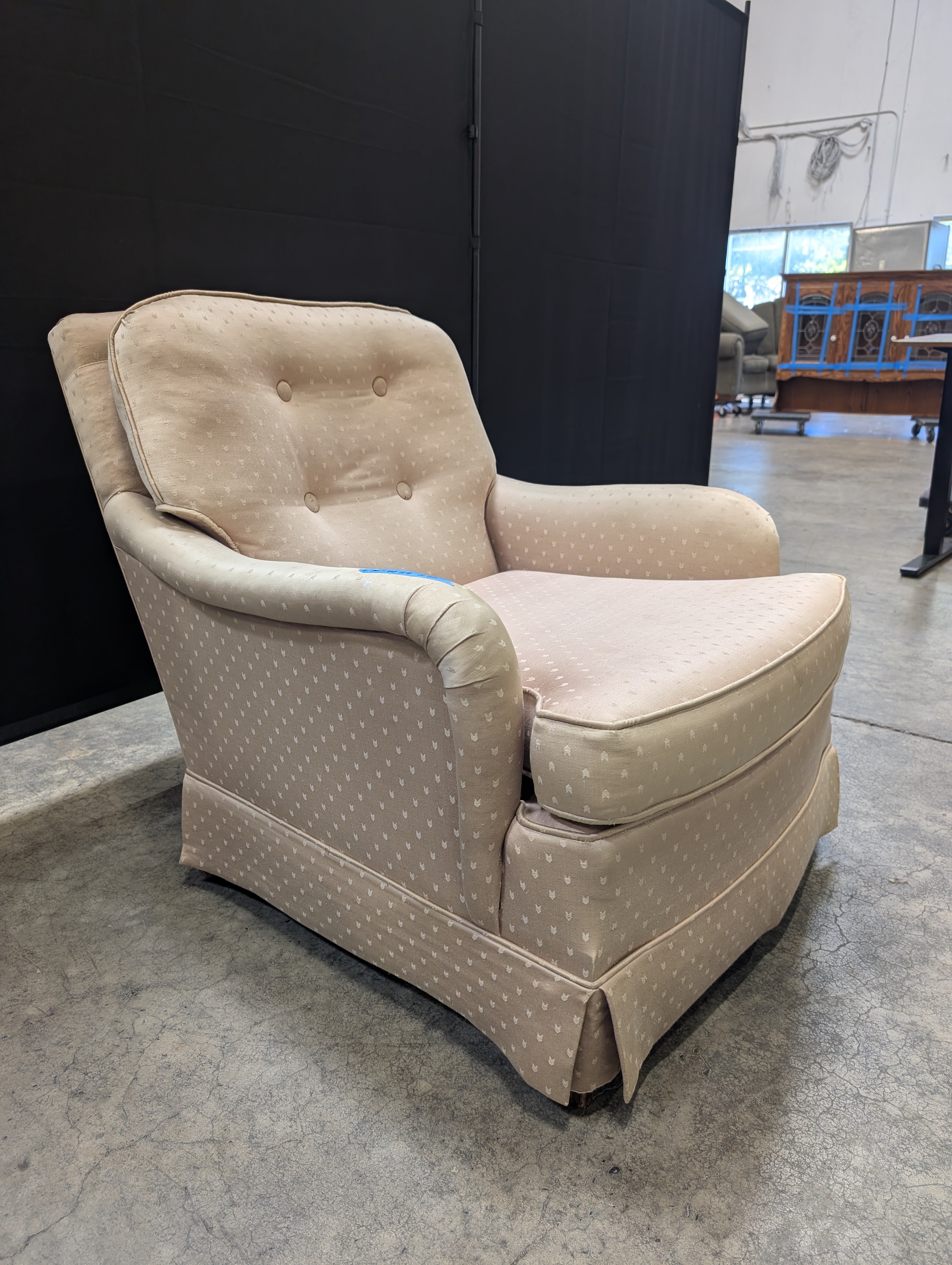 Classic Beige Upholstered Armchair with Dotted Fabric