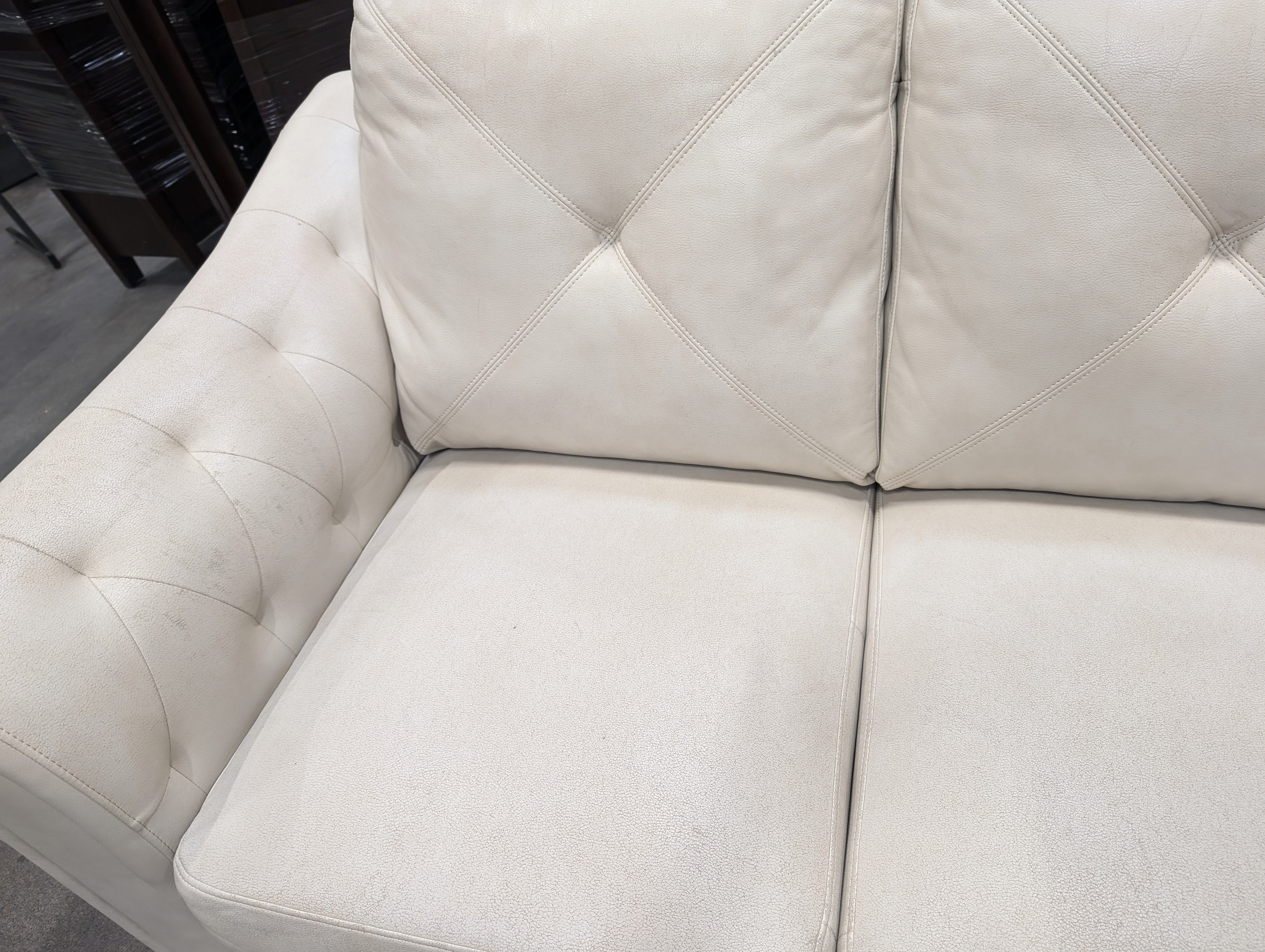 Light Beige Tufted Three-Seater Sofa