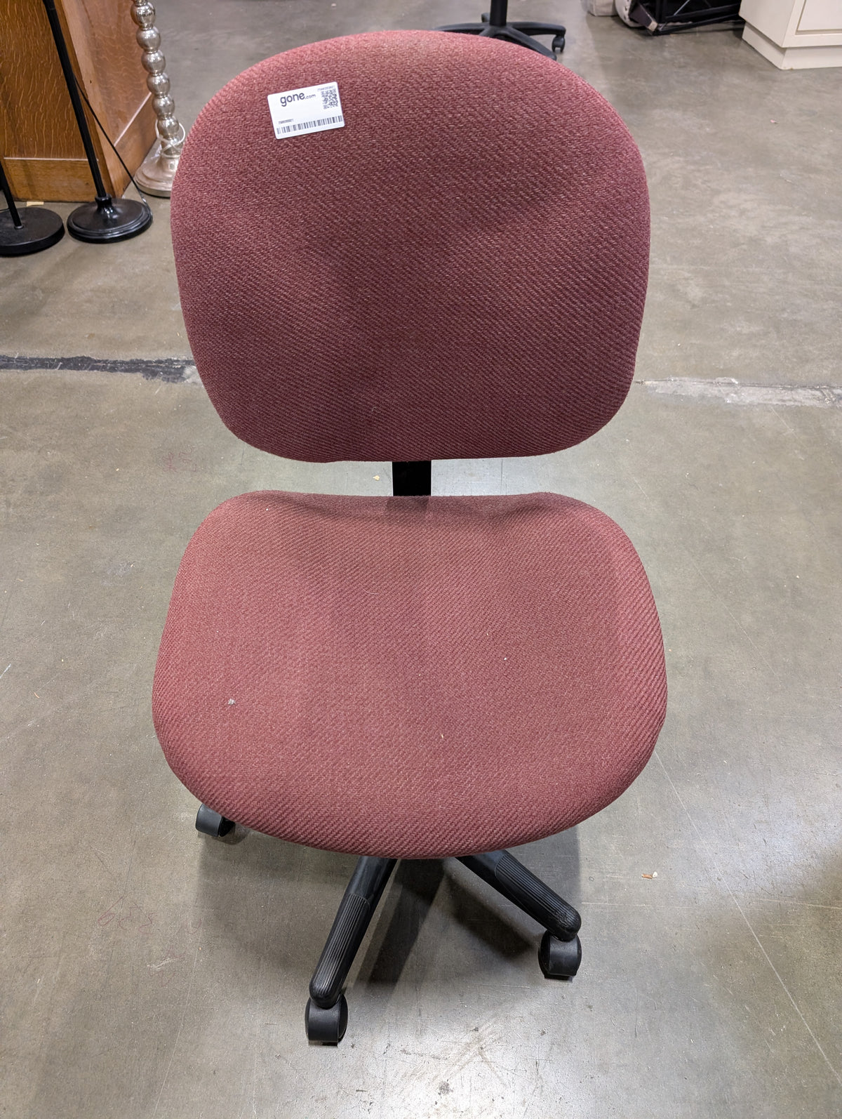 Red armless office chair