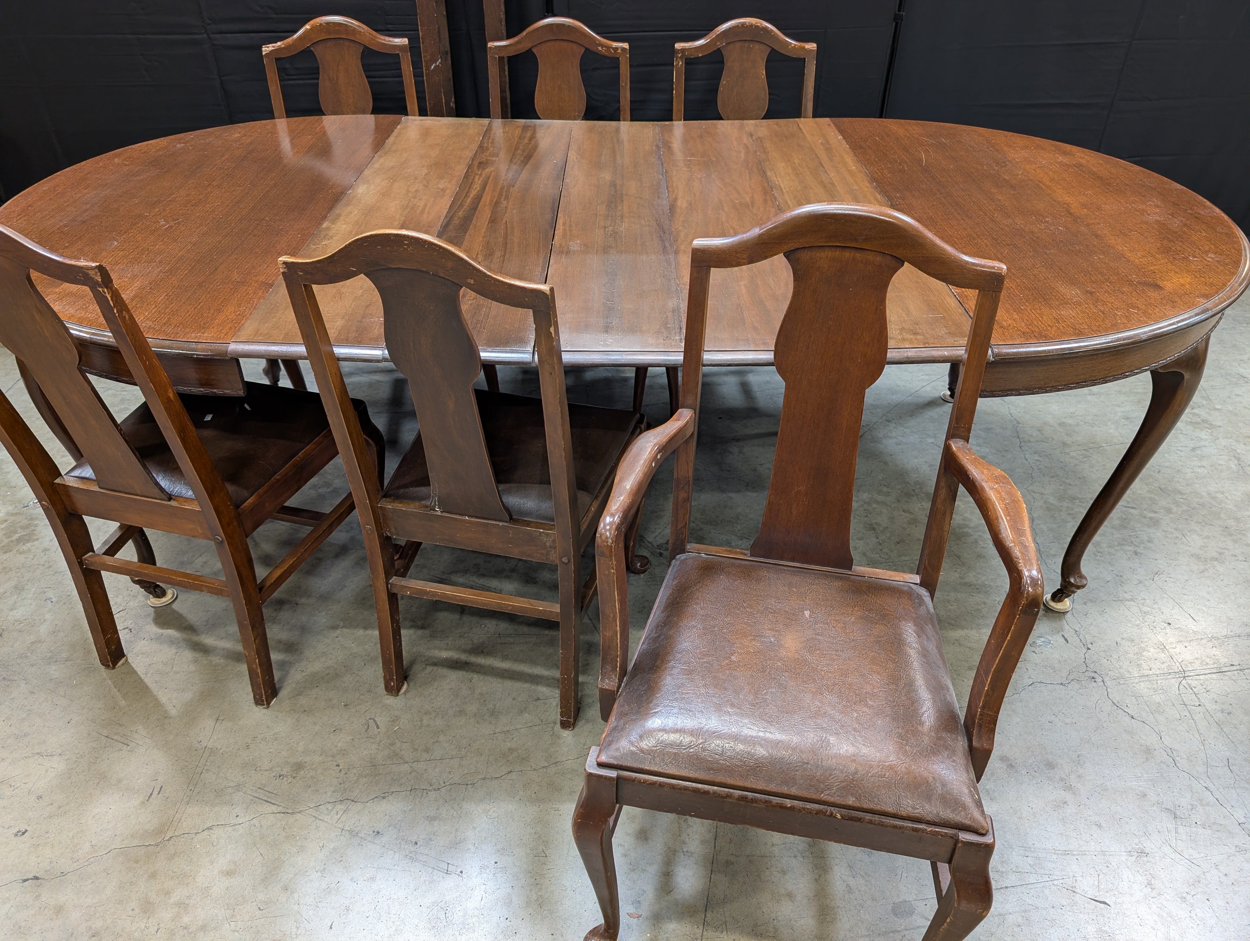 Antique Dark Wood Round Dining Table with six Dining Chairs