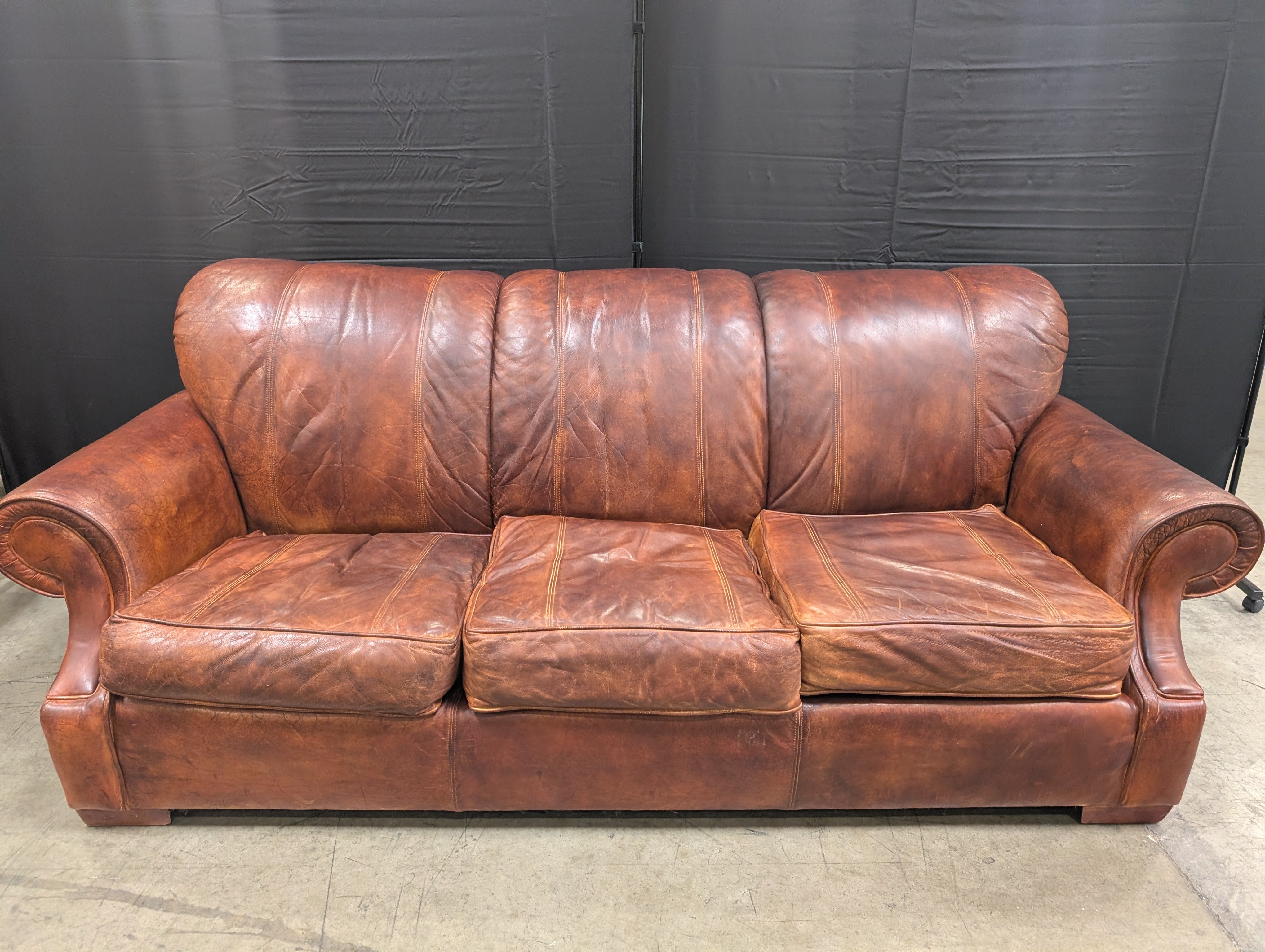 Classic Brown Leather Three-Seater Sofa with Rolled Arms