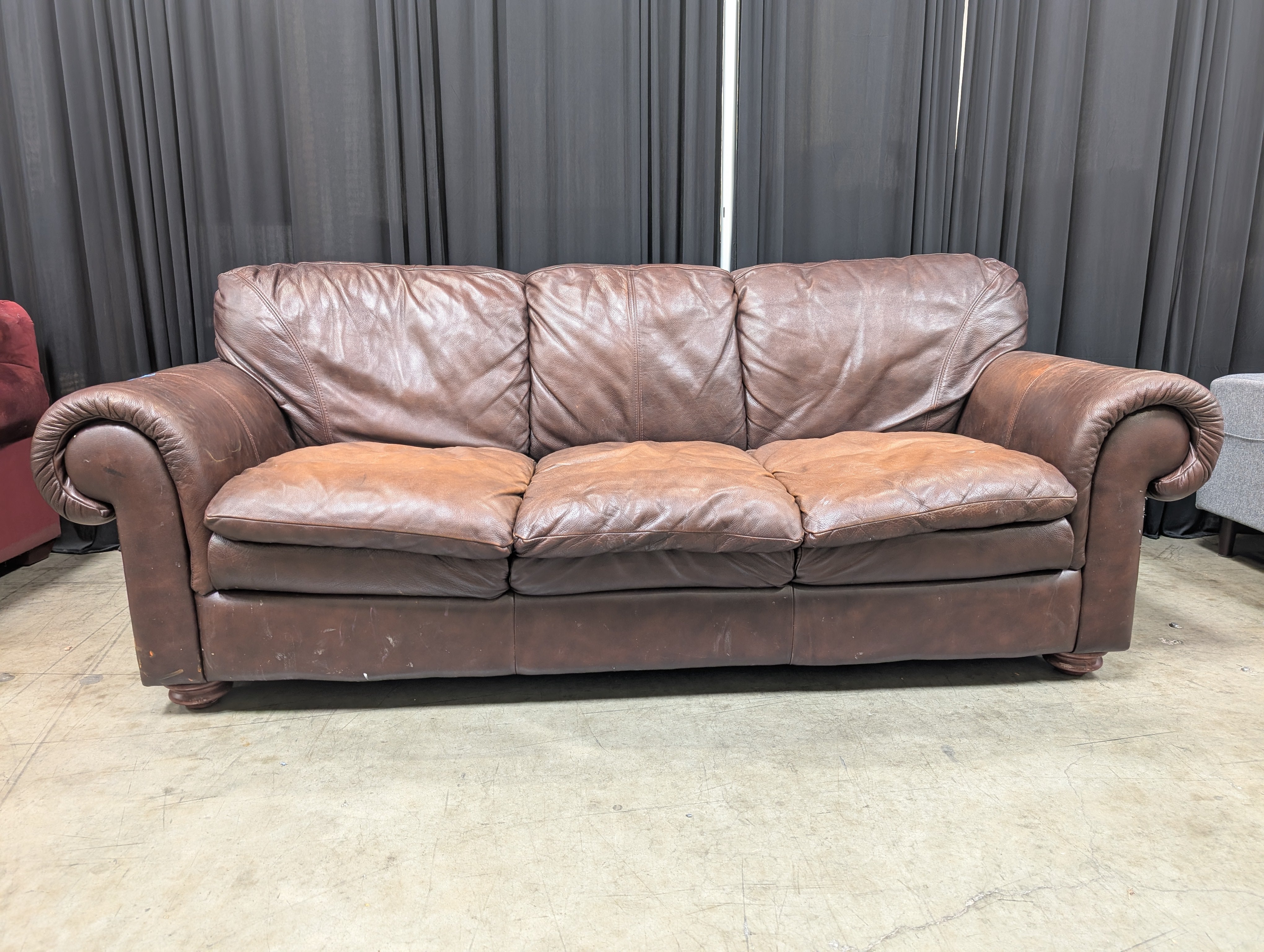 Brown Leather Three-Cushion Couch