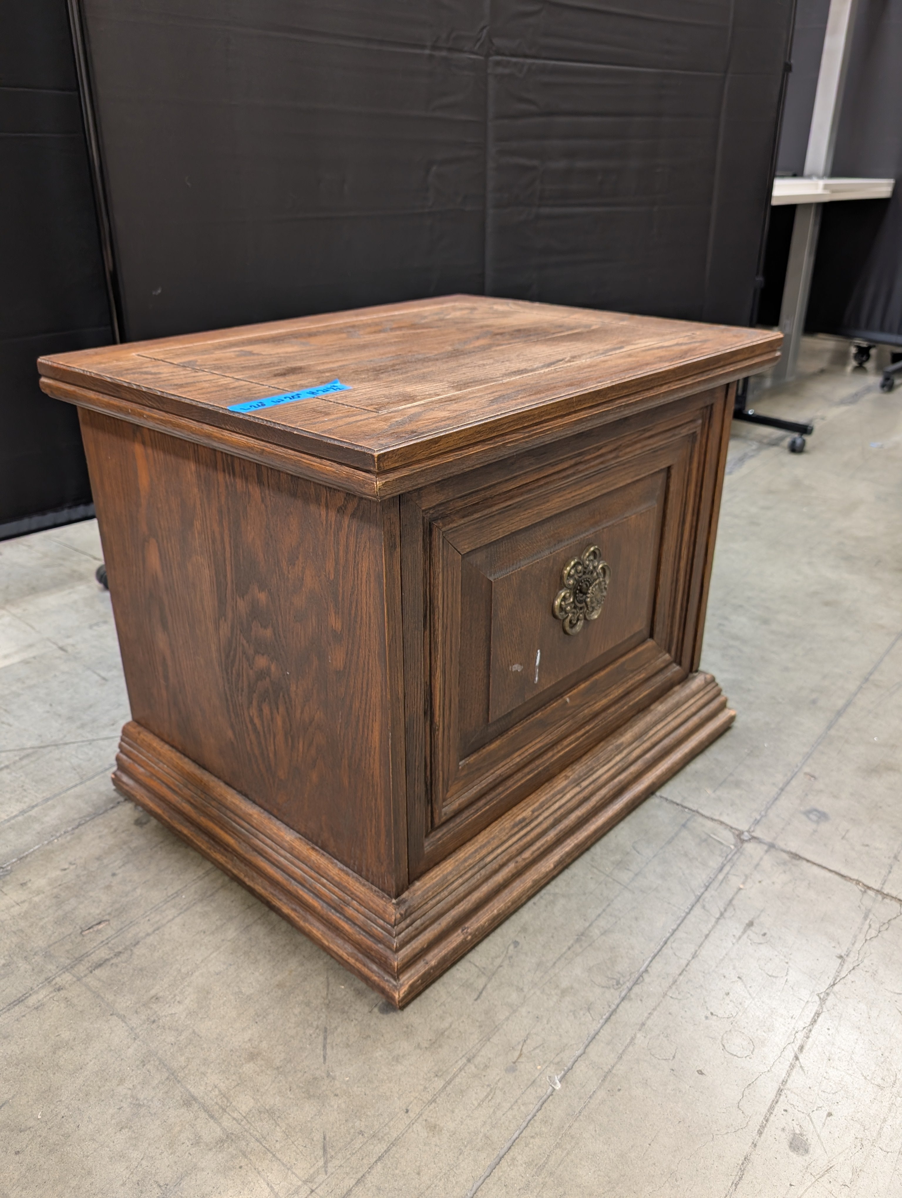 Traditional Hardwood Nightstand with Ornate Medallion Pull