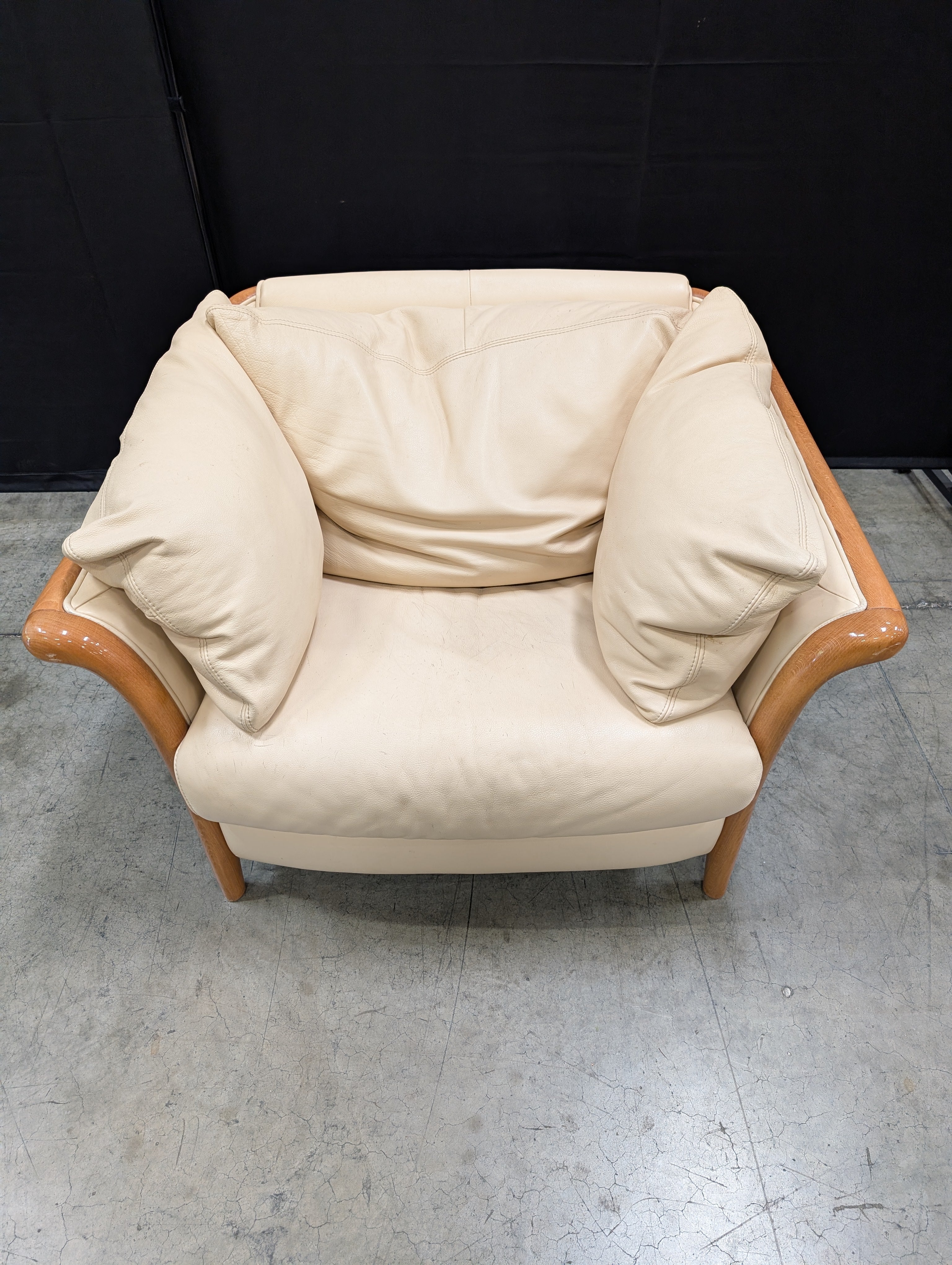 Beige leather Chair with Exposed Wood Frame