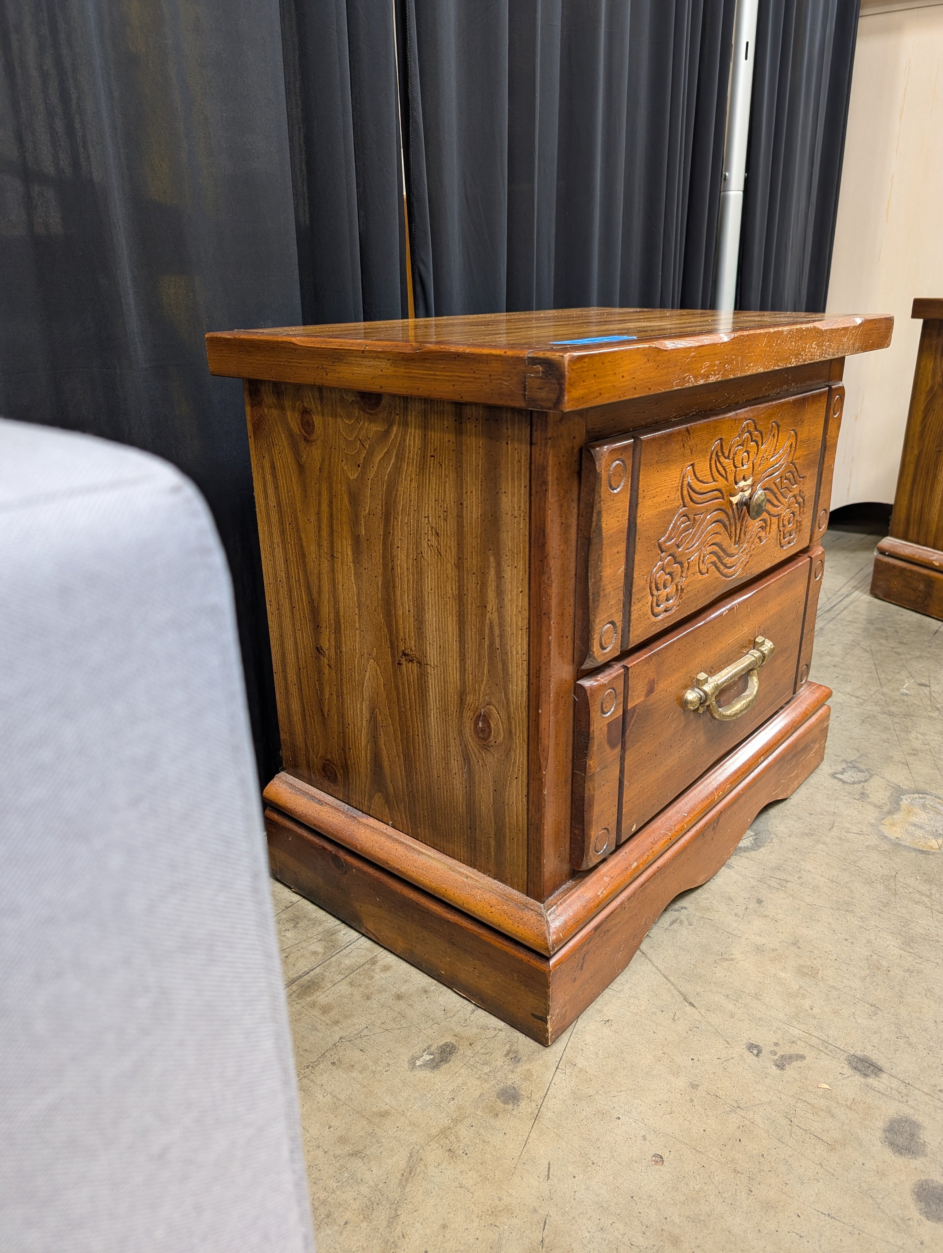 Traditional Carved Wood Nightstand with Brass Hardware
