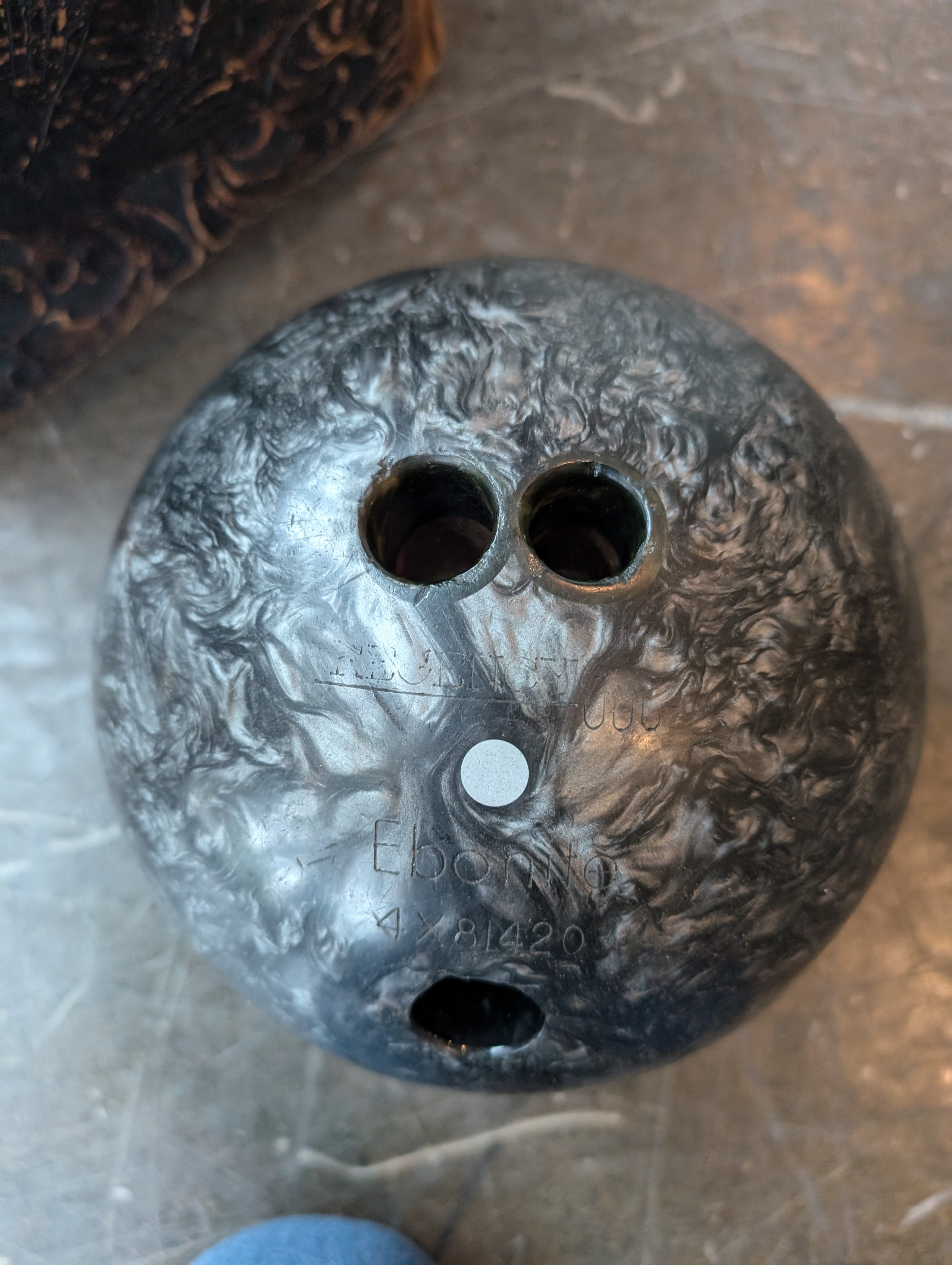 Ebonite Bowling Ball with Textured Brown Carry Bag