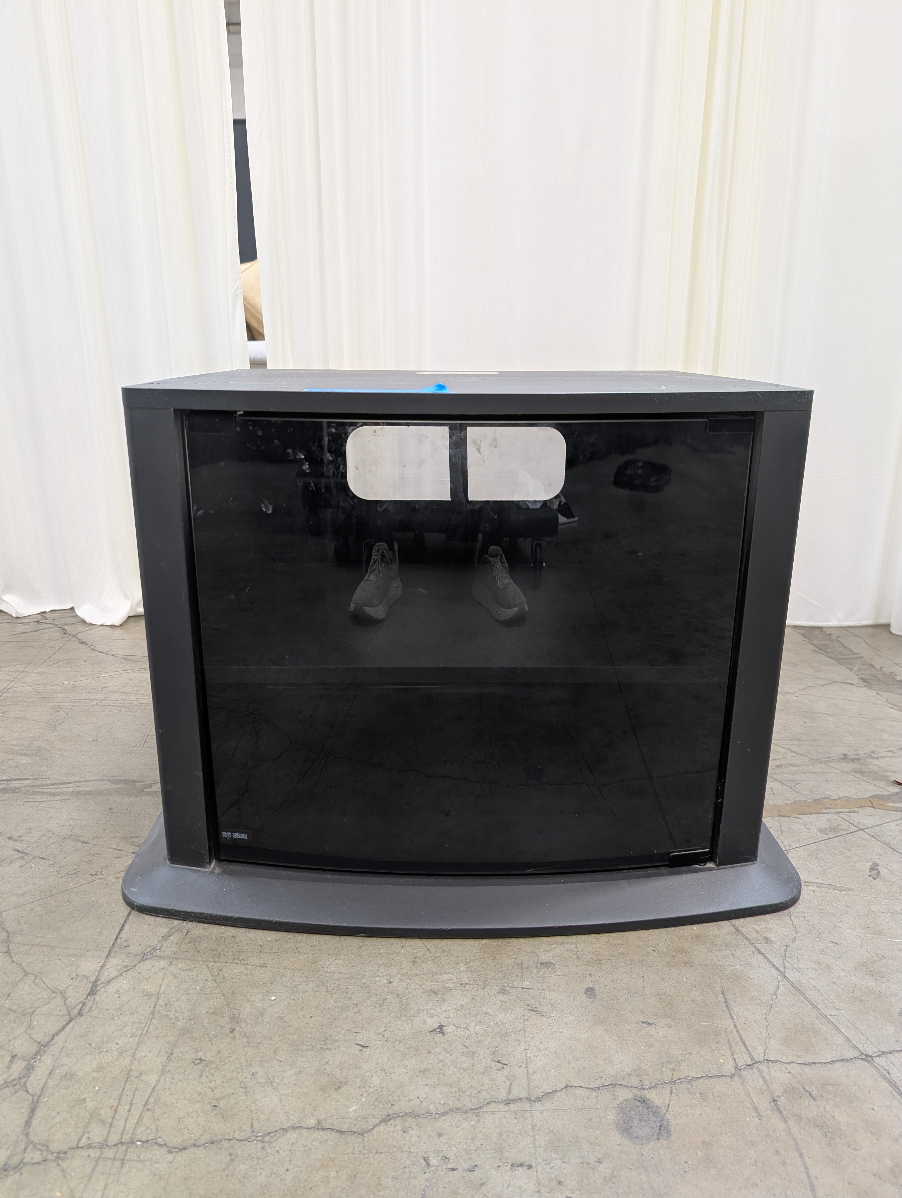 Curved Black Glass TV Stand with Tinted Door