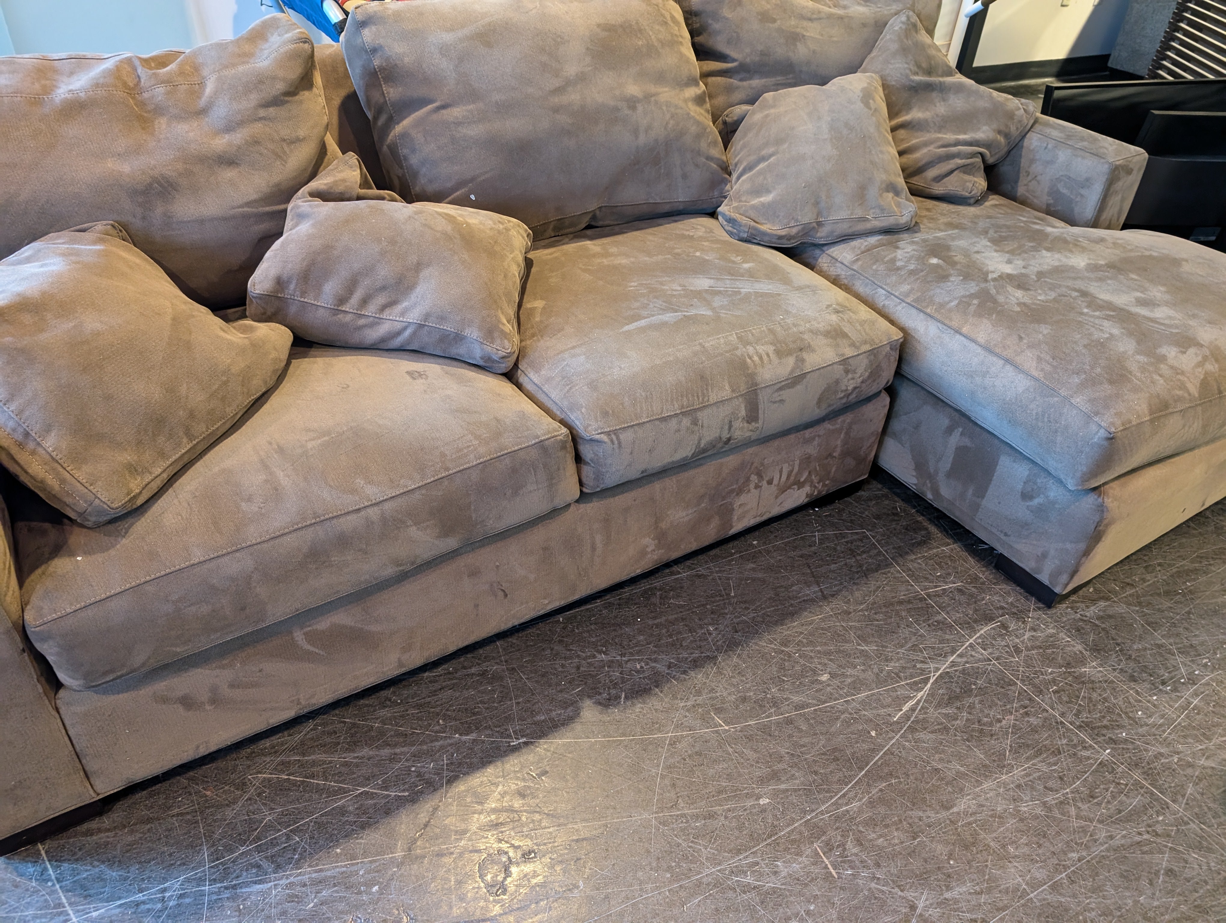 Spacious Taupe Sectional Sofa with Integrated Chaise