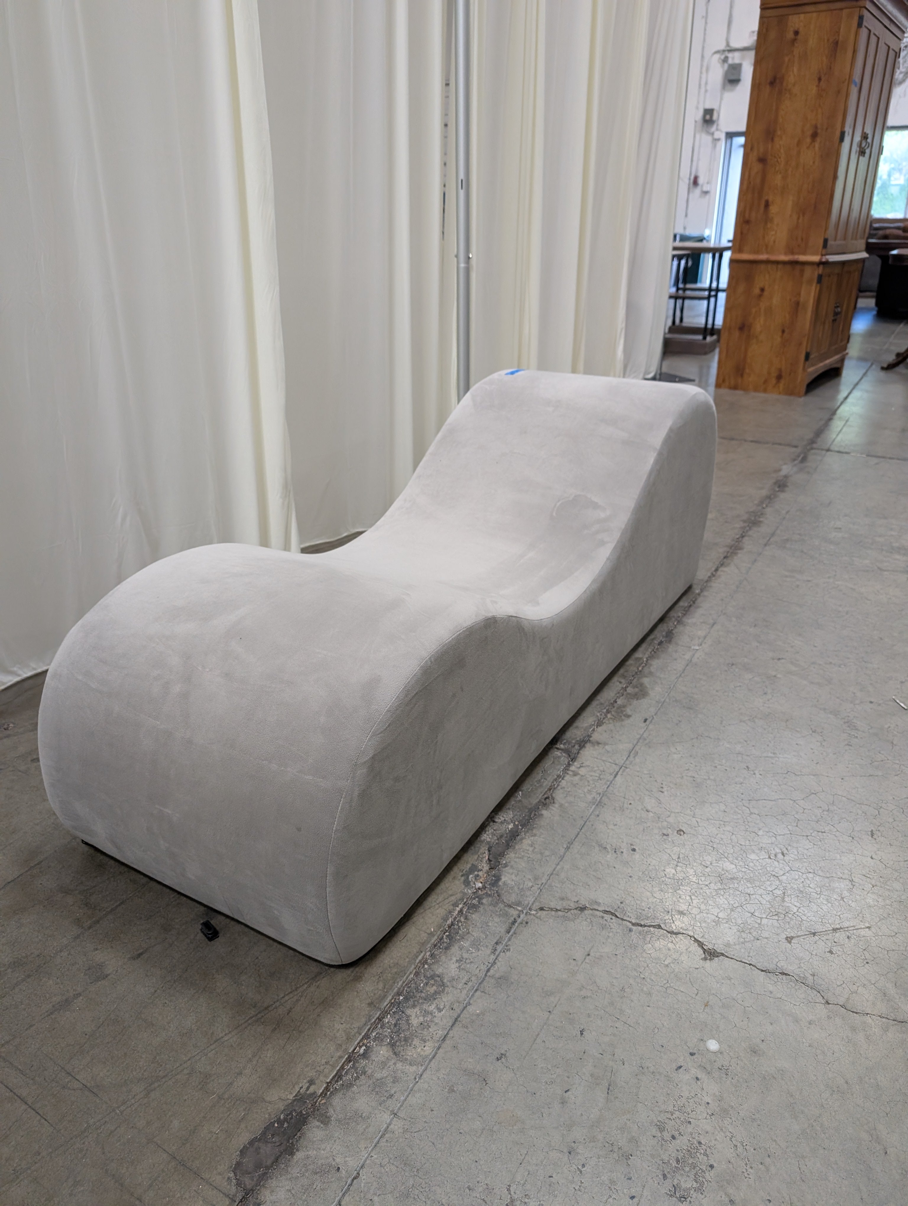 Light Beige Upholstered Curved Sofa