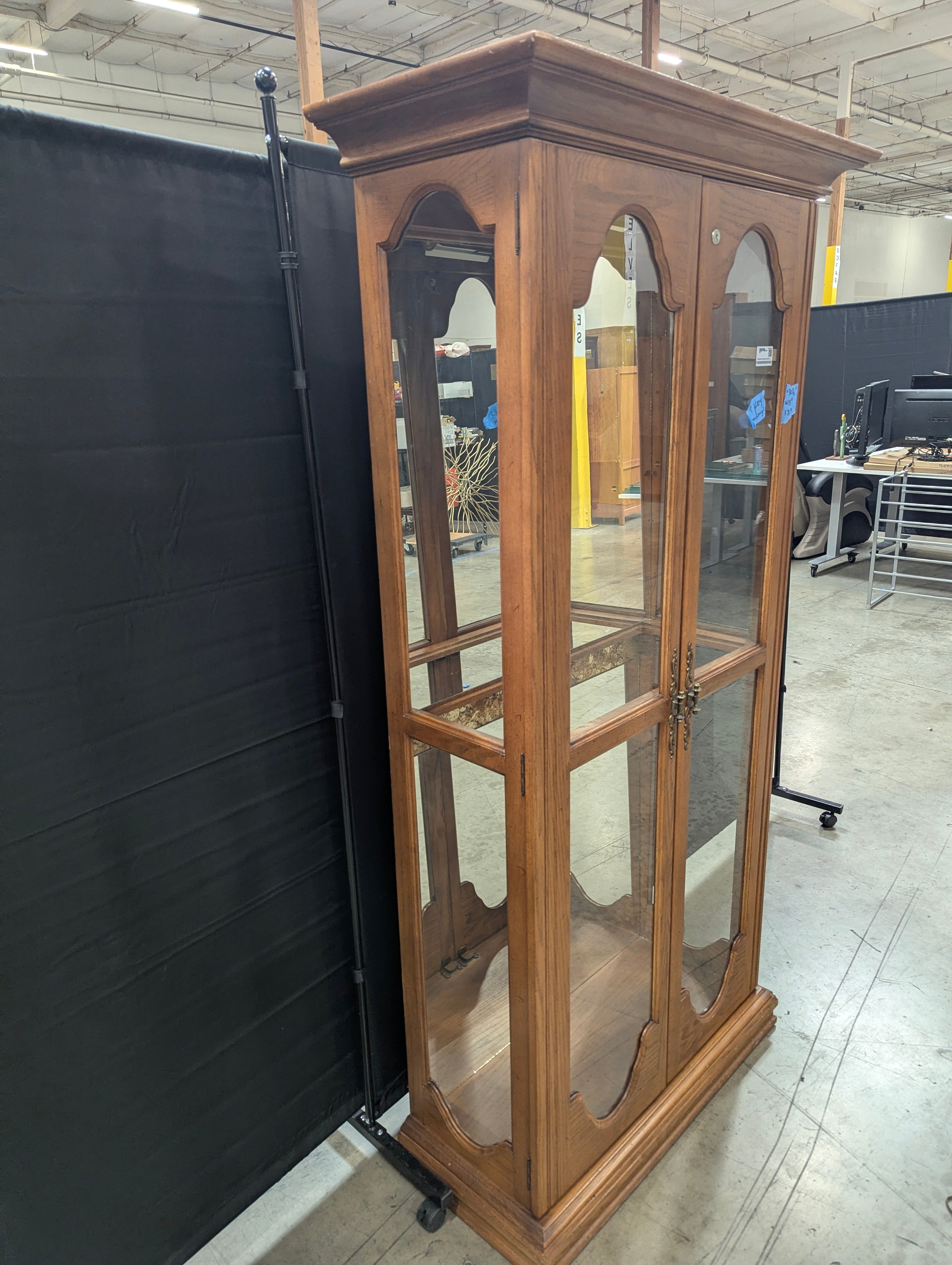 Traditional Wood and Glass Curio Cabinet with Arched Doors