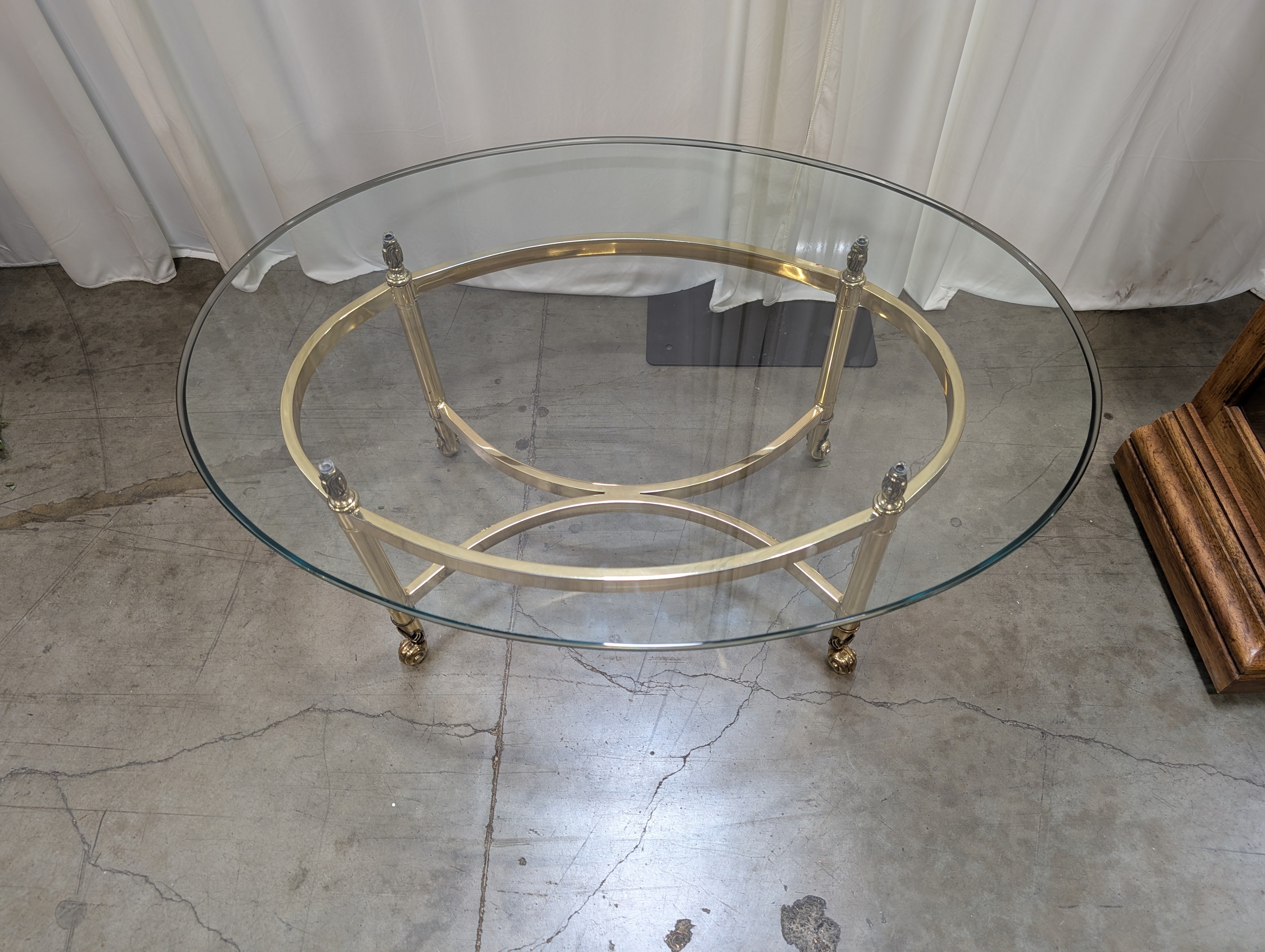 Oval Glass Top Coffee Table with Casters