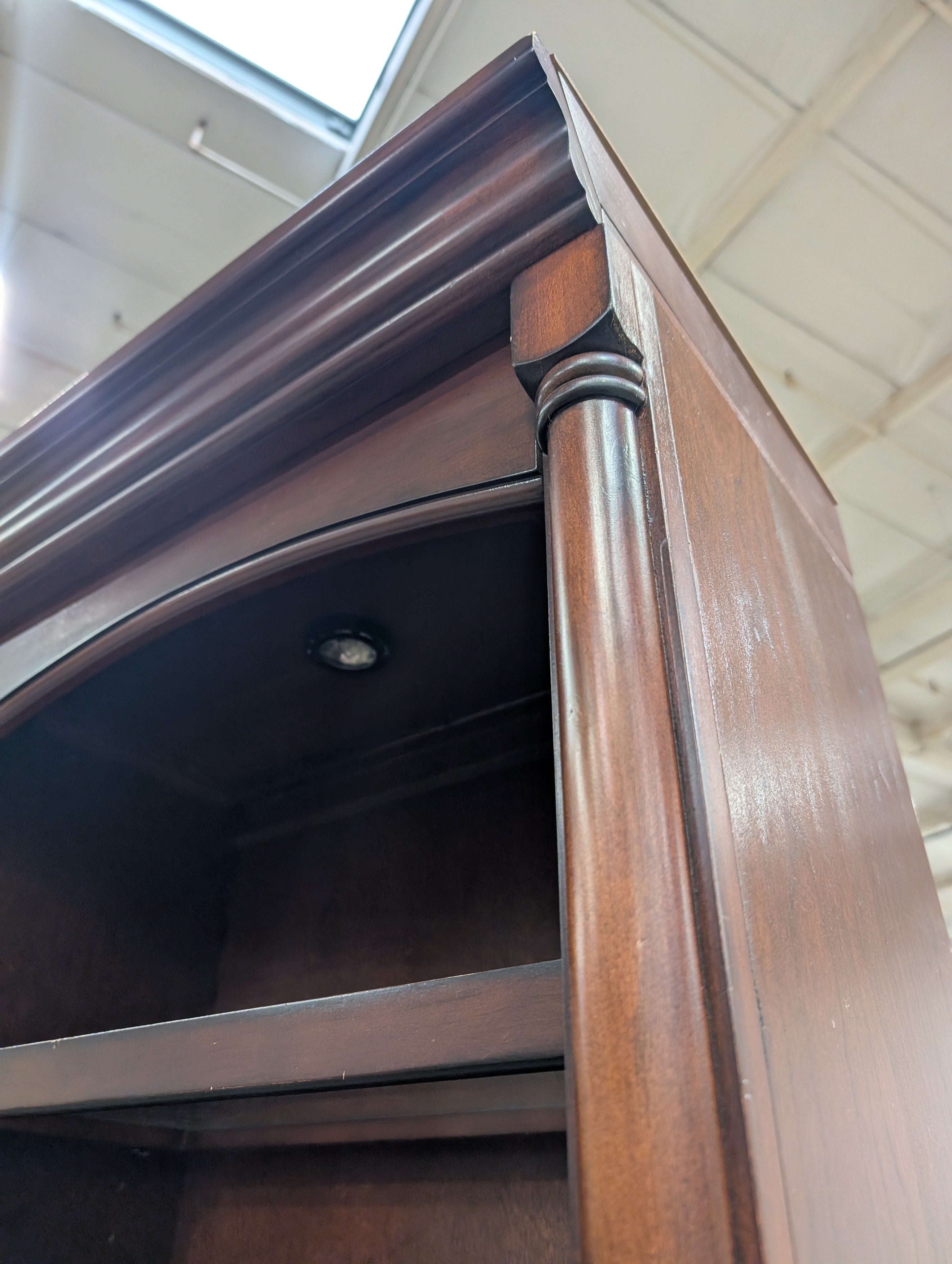 Traditional Dark Wood Bookcase with Arched Top Sections