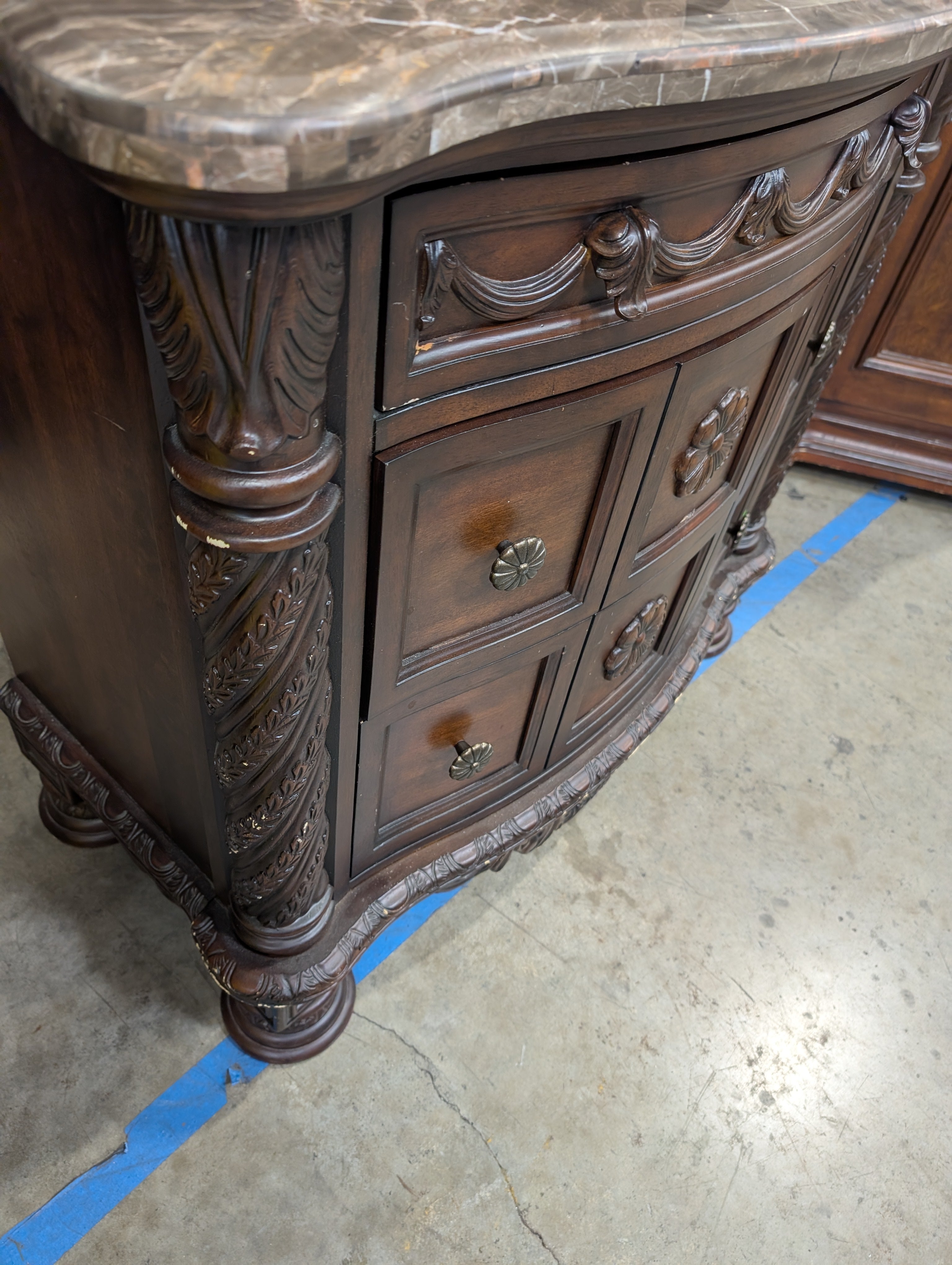 Carved Dark Wood Nightstand with Marble Top