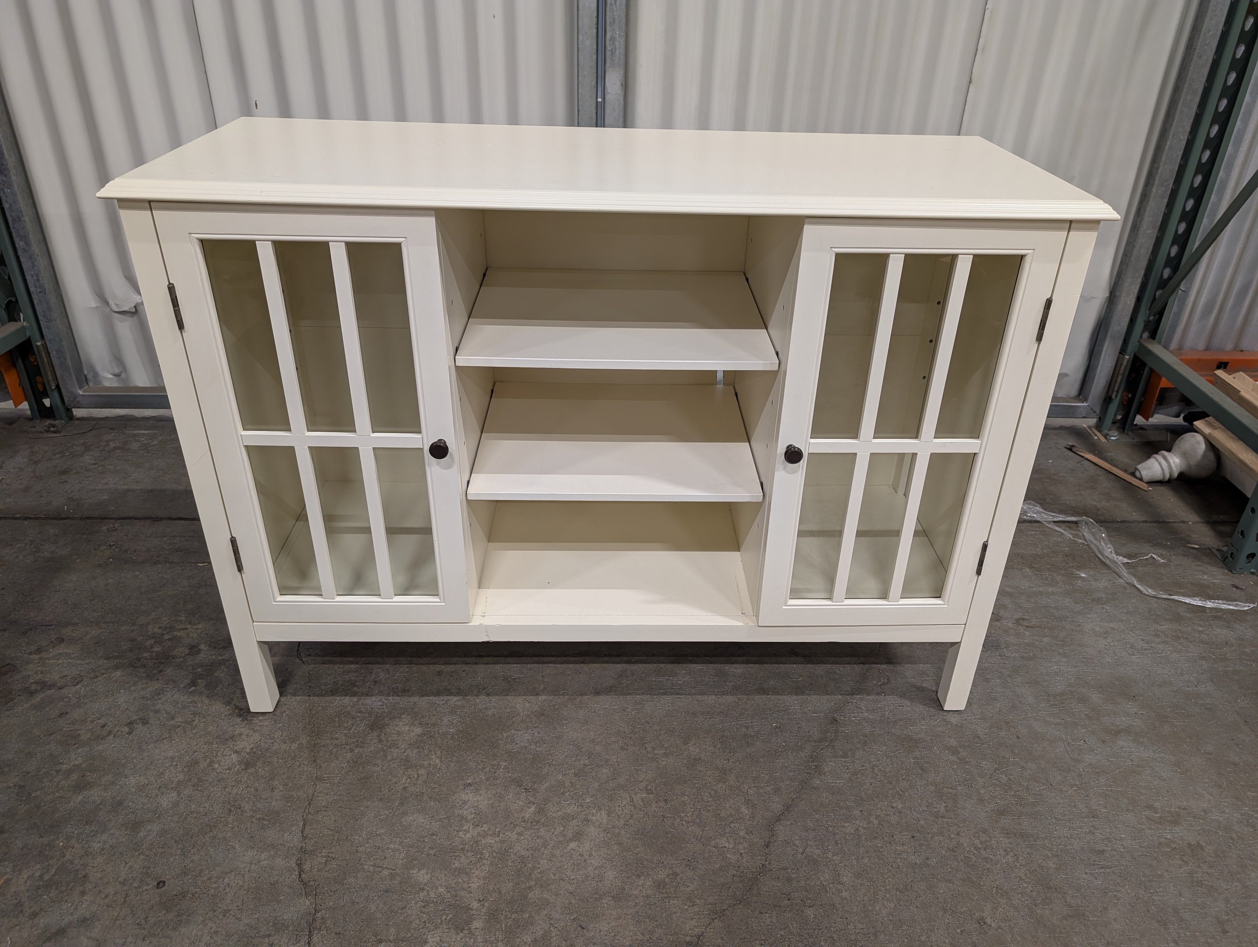 Versatile White Storage Console with Paneled Glass Doors