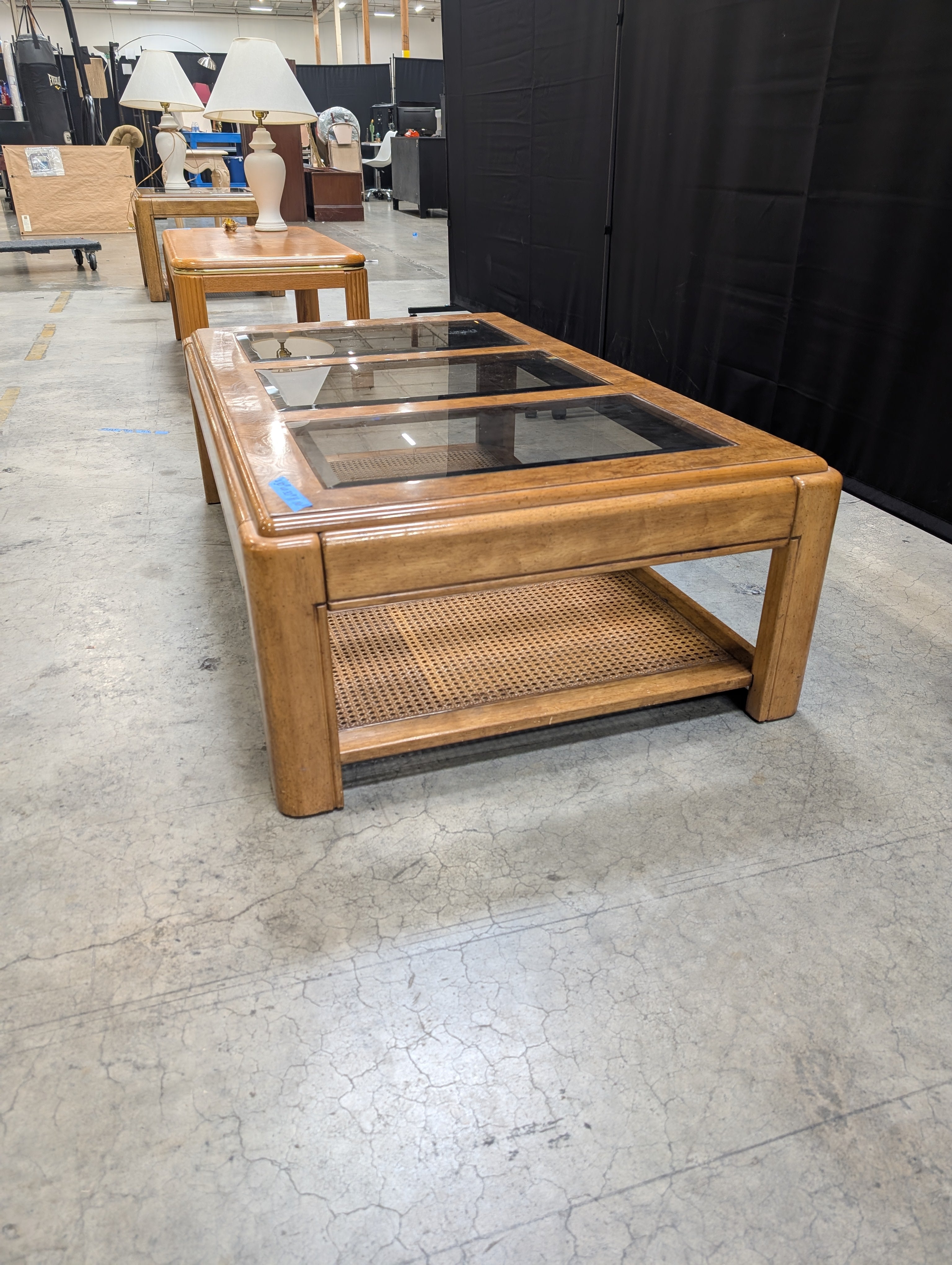 Vintage Style Burled Wood Coffee Table with Glass Top and Cane Accents