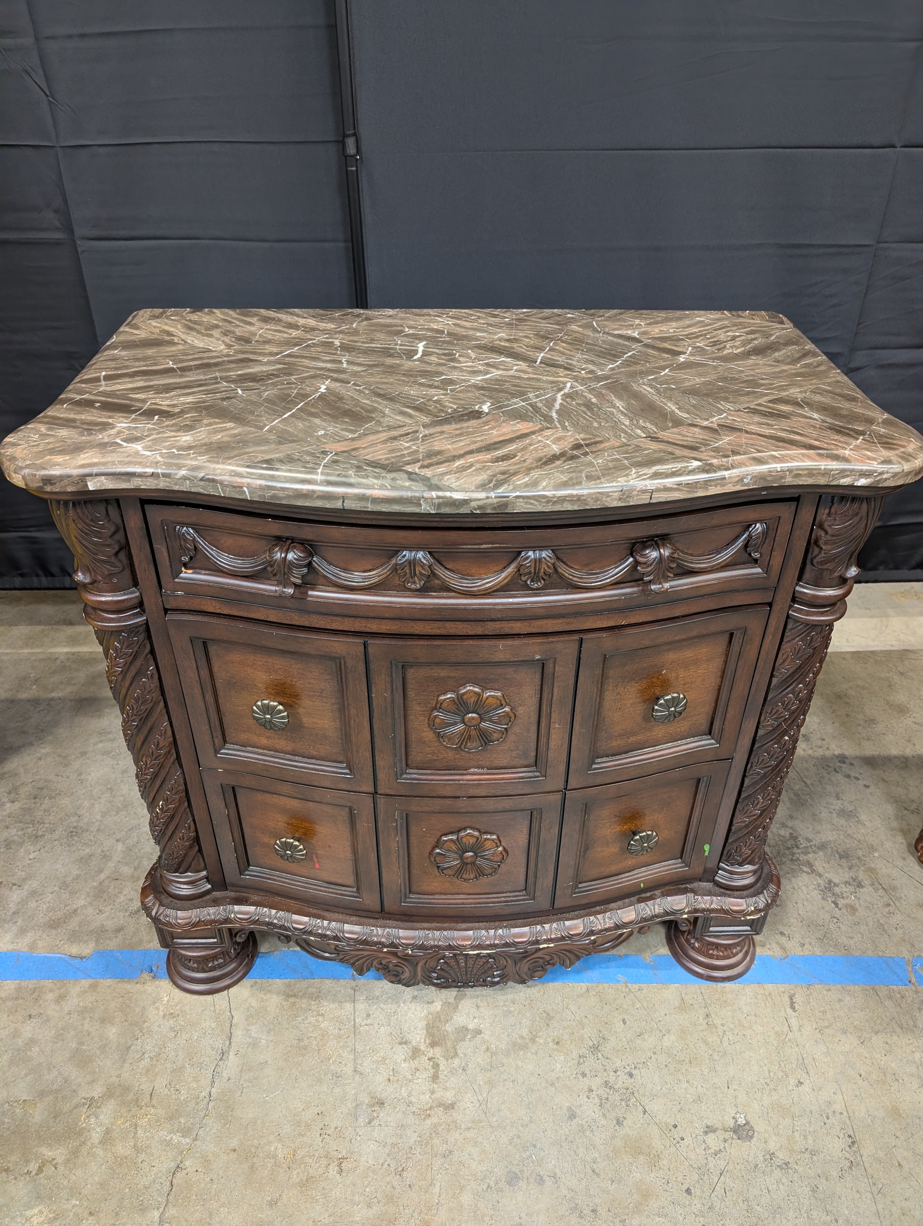 Carved Dark Wood Nightstand with Marble Top