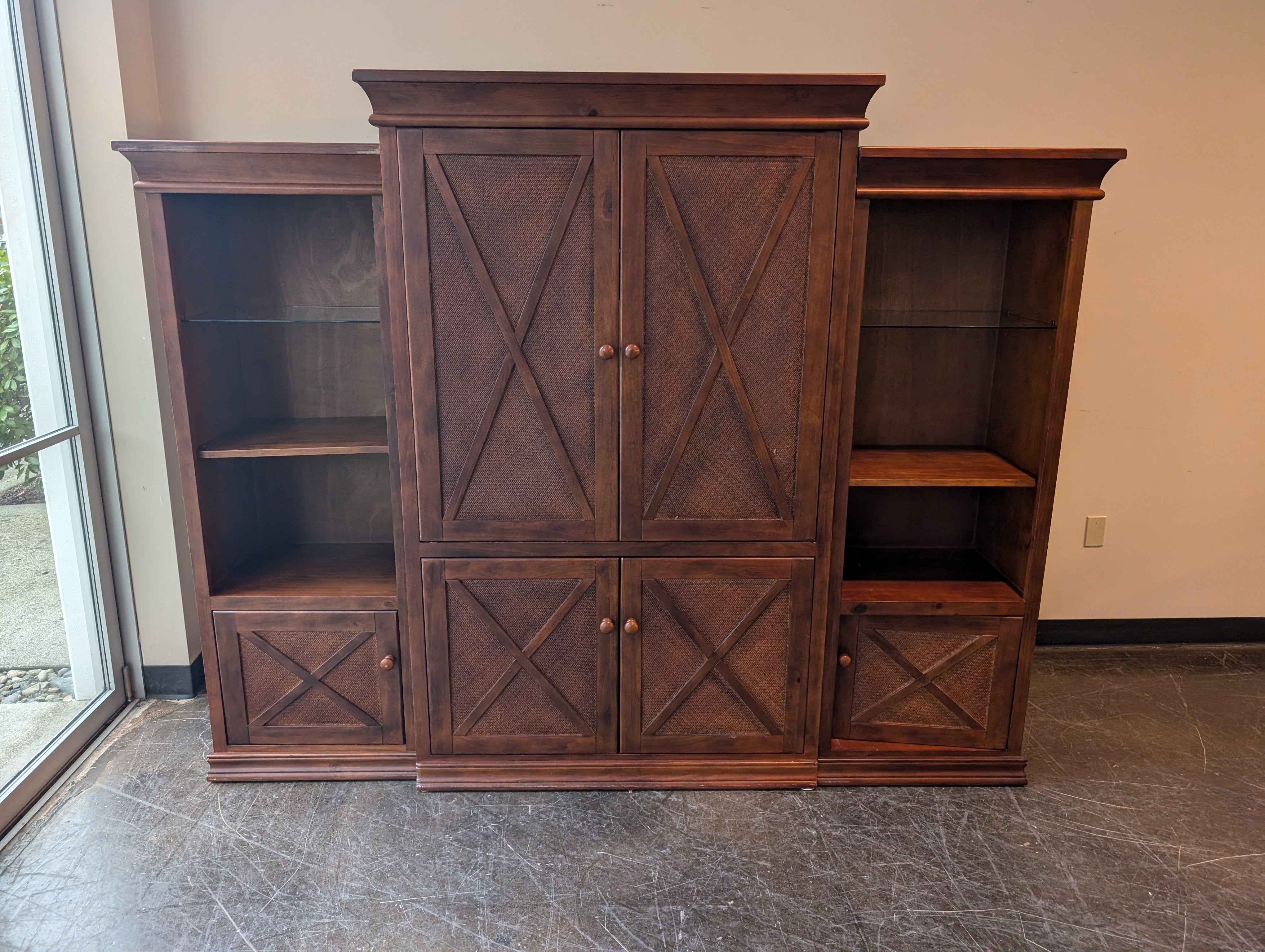 Spacious Brown Wood Entertainment Center with Woven Cabinet Doors