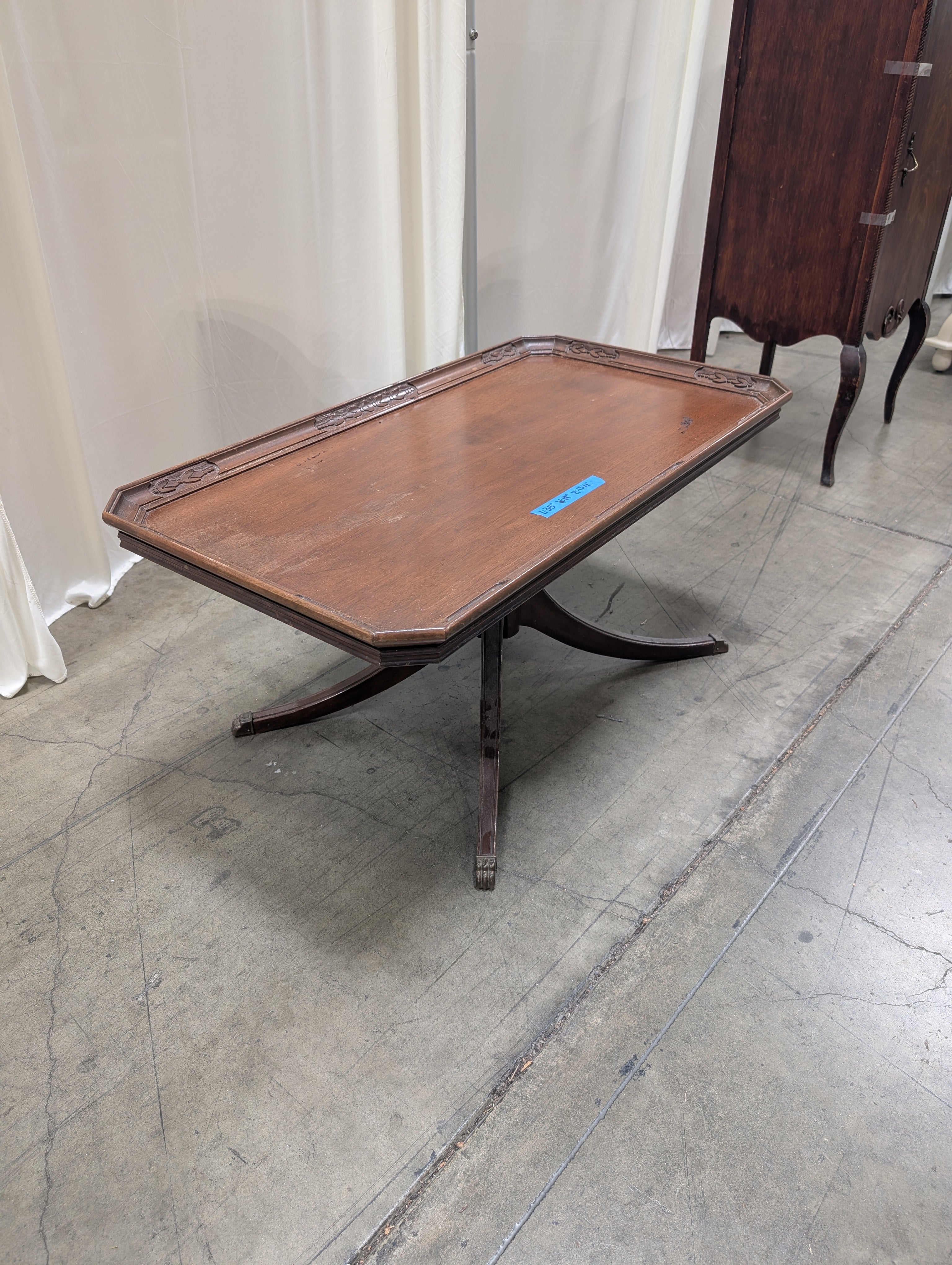 Carved Wood Coffee Table with Glass Insert