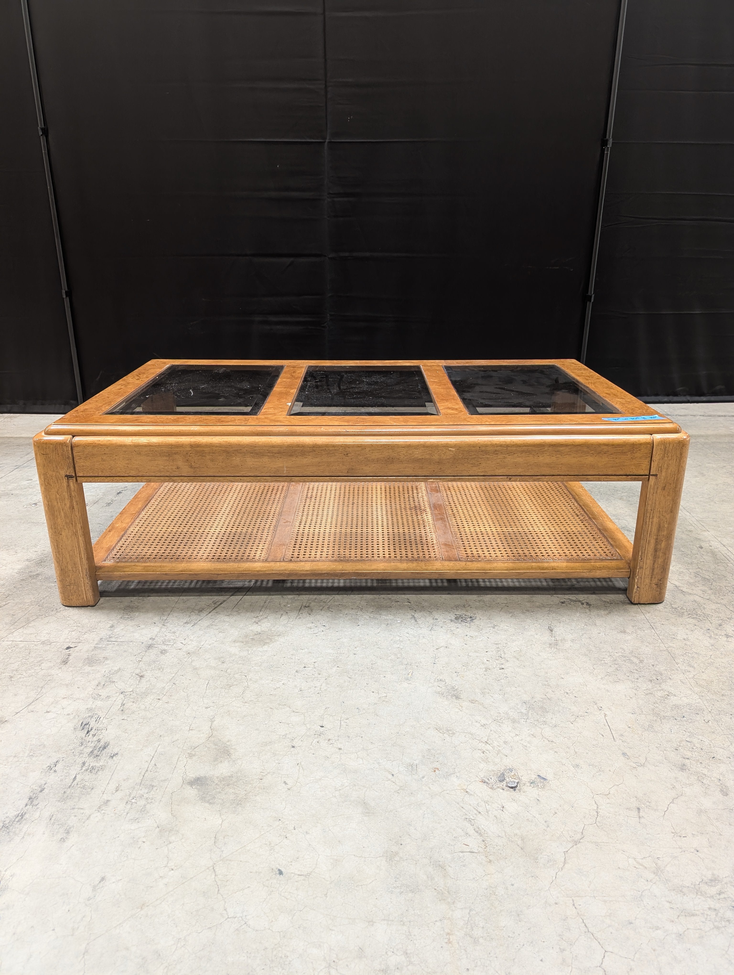 Vintage Style Burled Wood Coffee Table with Glass Top and Cane Accents