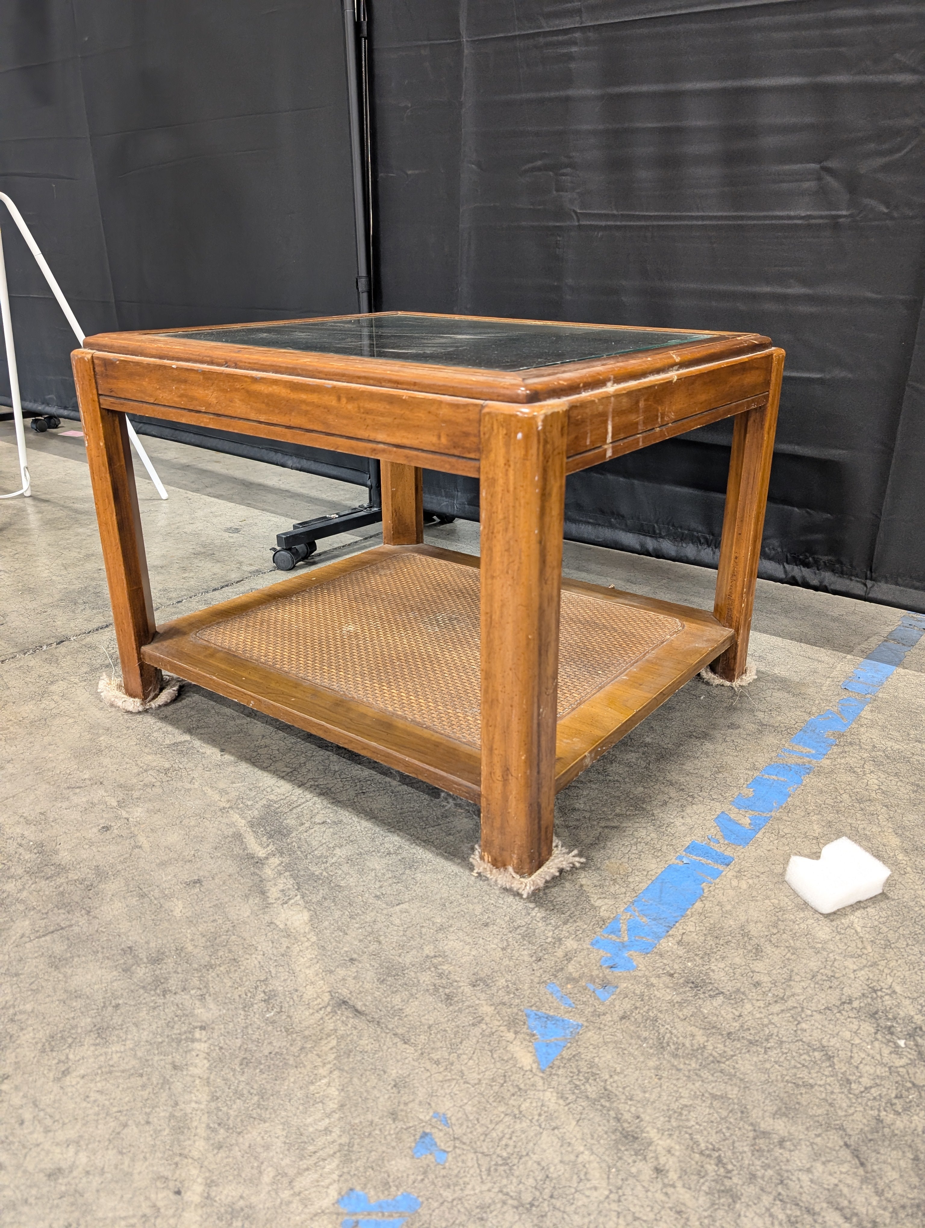 Brown Wood and Glass End Table with Wicker Shelf
