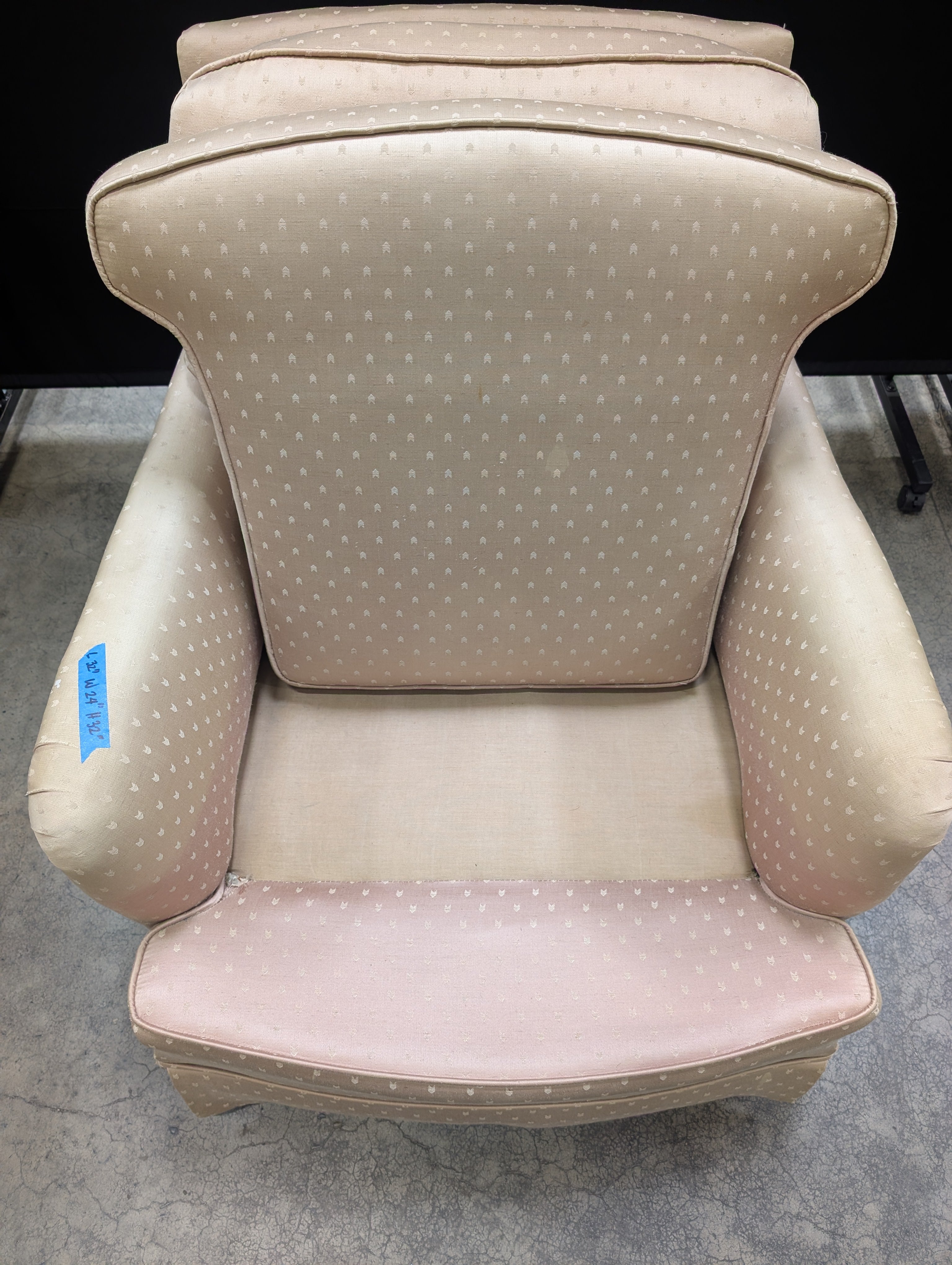 Classic Beige Upholstered Armchair with Dotted Fabric