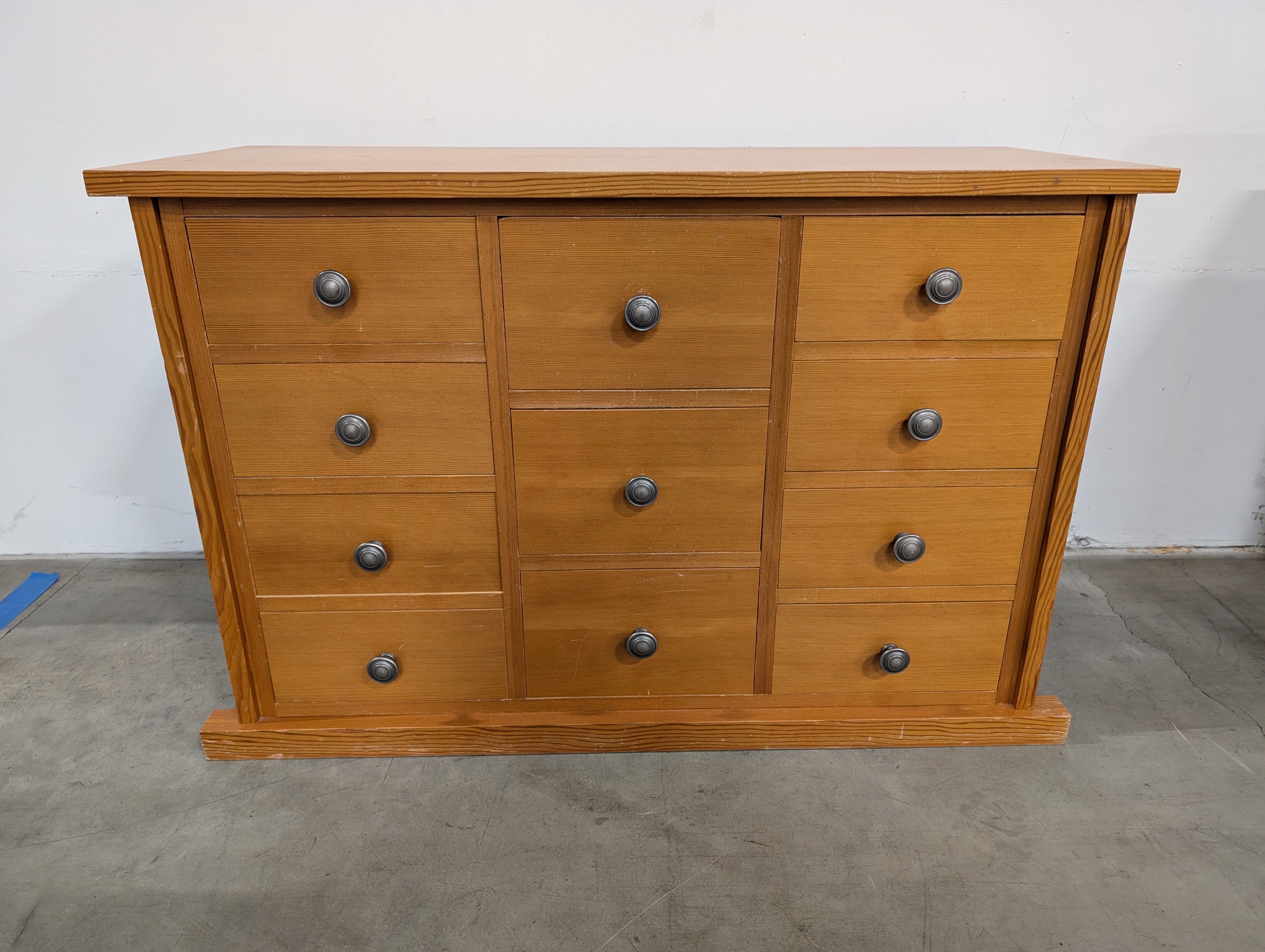 Warm Honey Wood Nine-Drawer Storage Chest